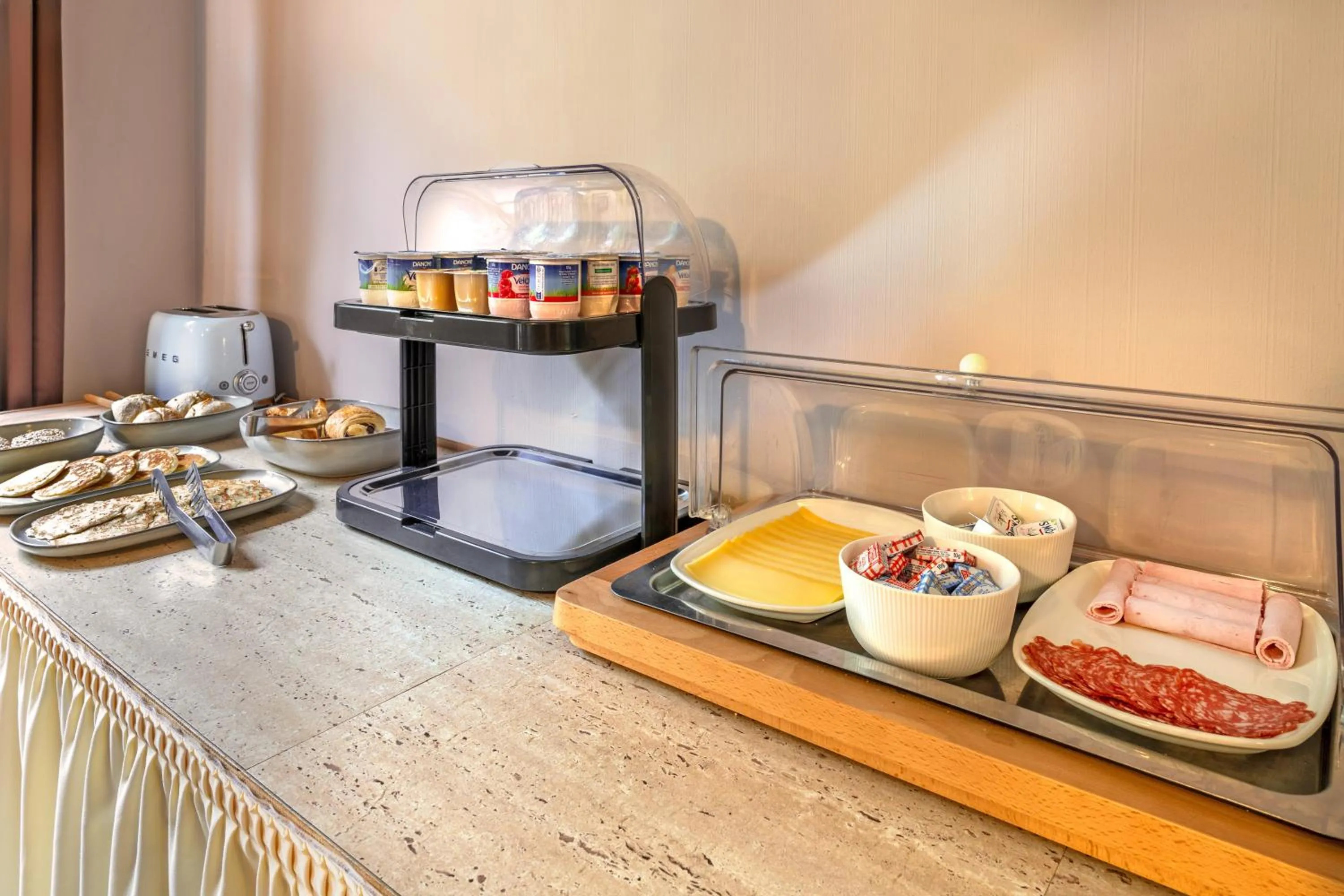 Buffet breakfast in Logis Hotel De La Corniche