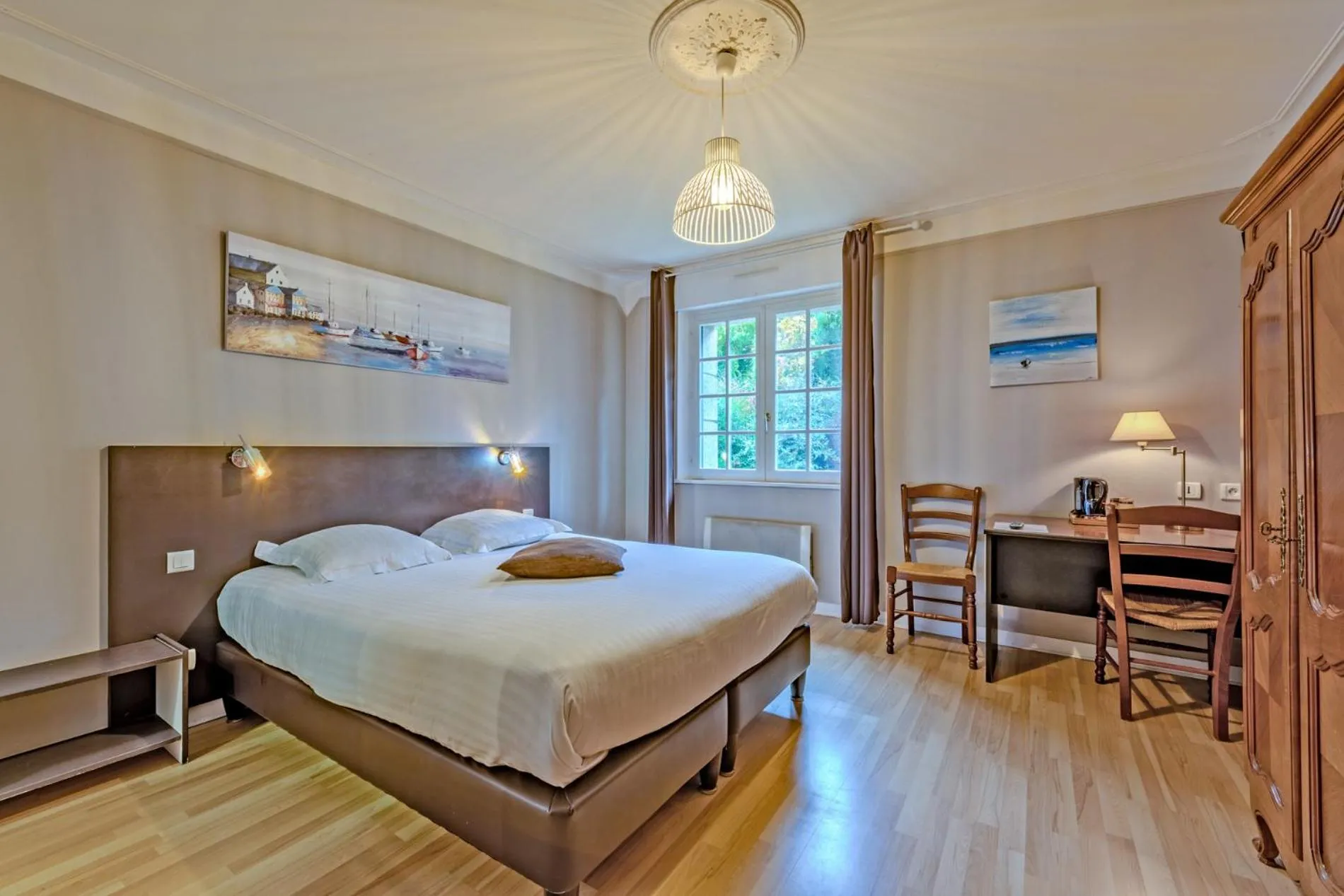 Bed in Logis Hotel De La Corniche