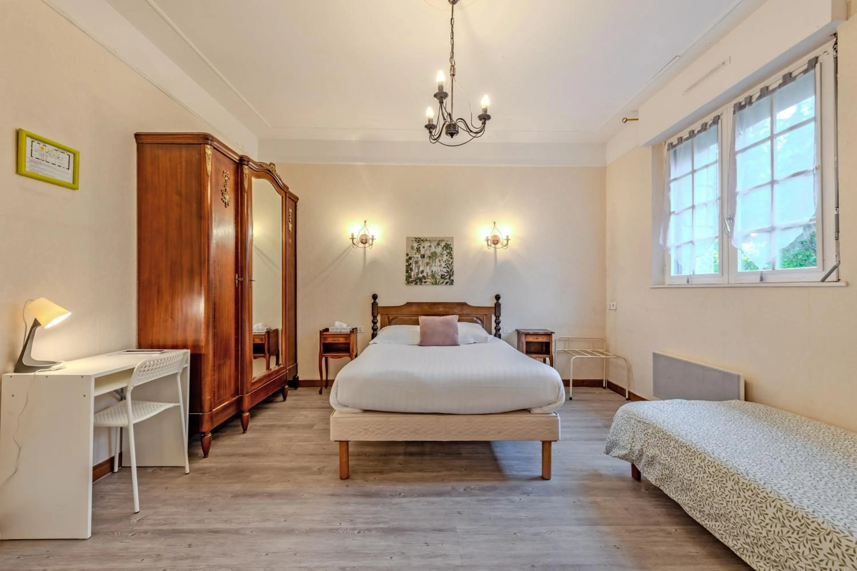 Bed in Logis Hotel De La Corniche