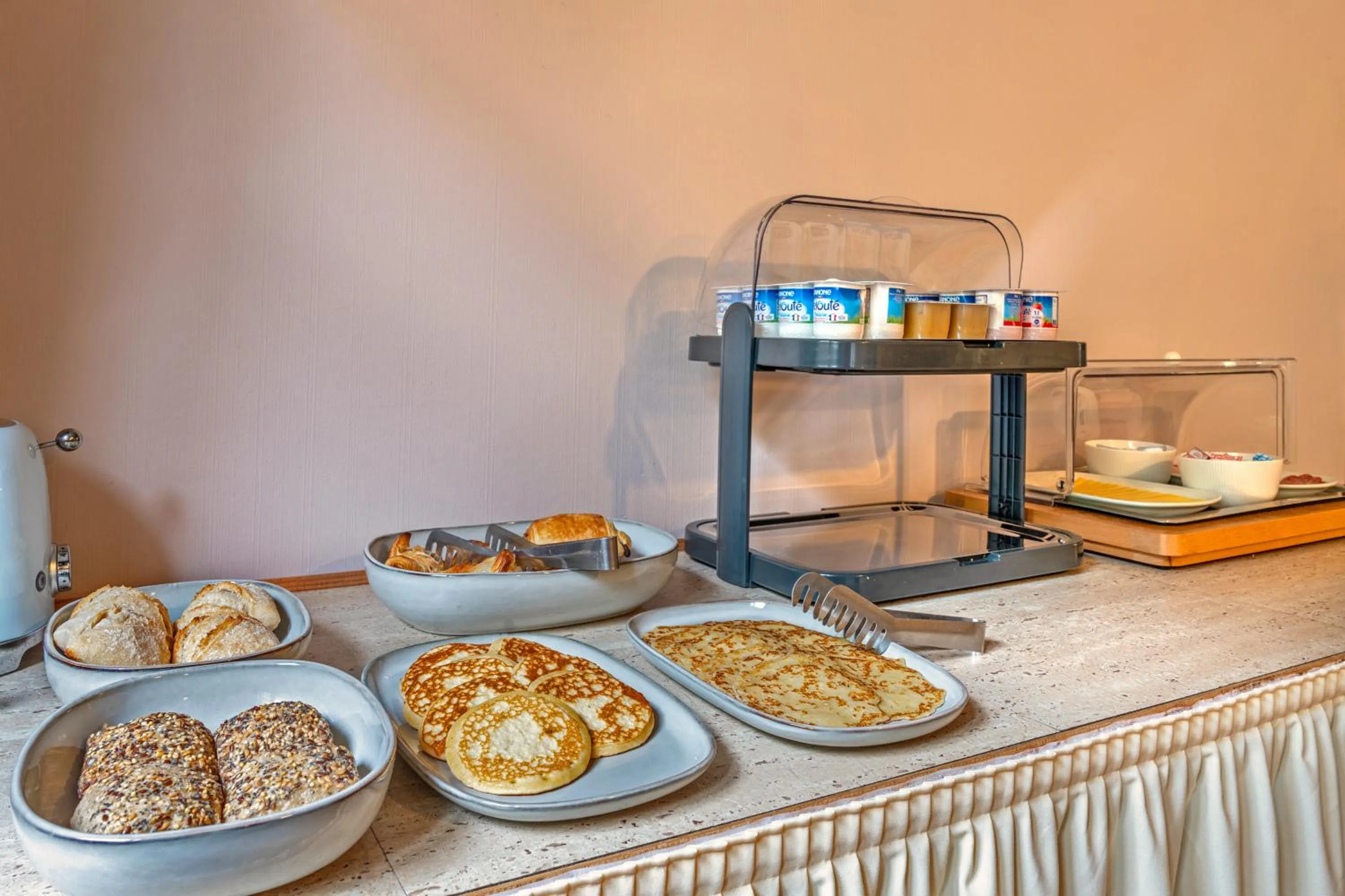 Buffet breakfast in Logis Hotel De La Corniche