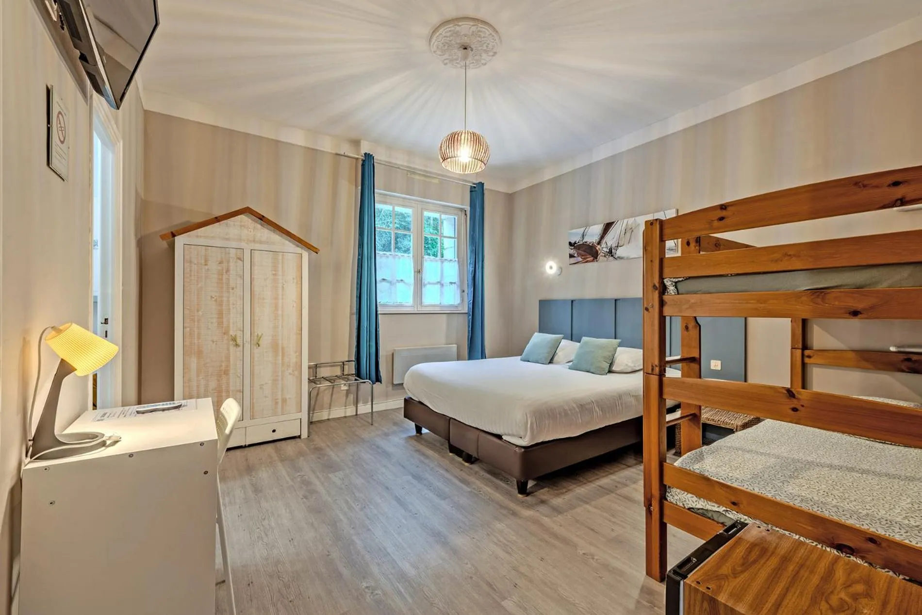 Bed in Logis Hotel De La Corniche