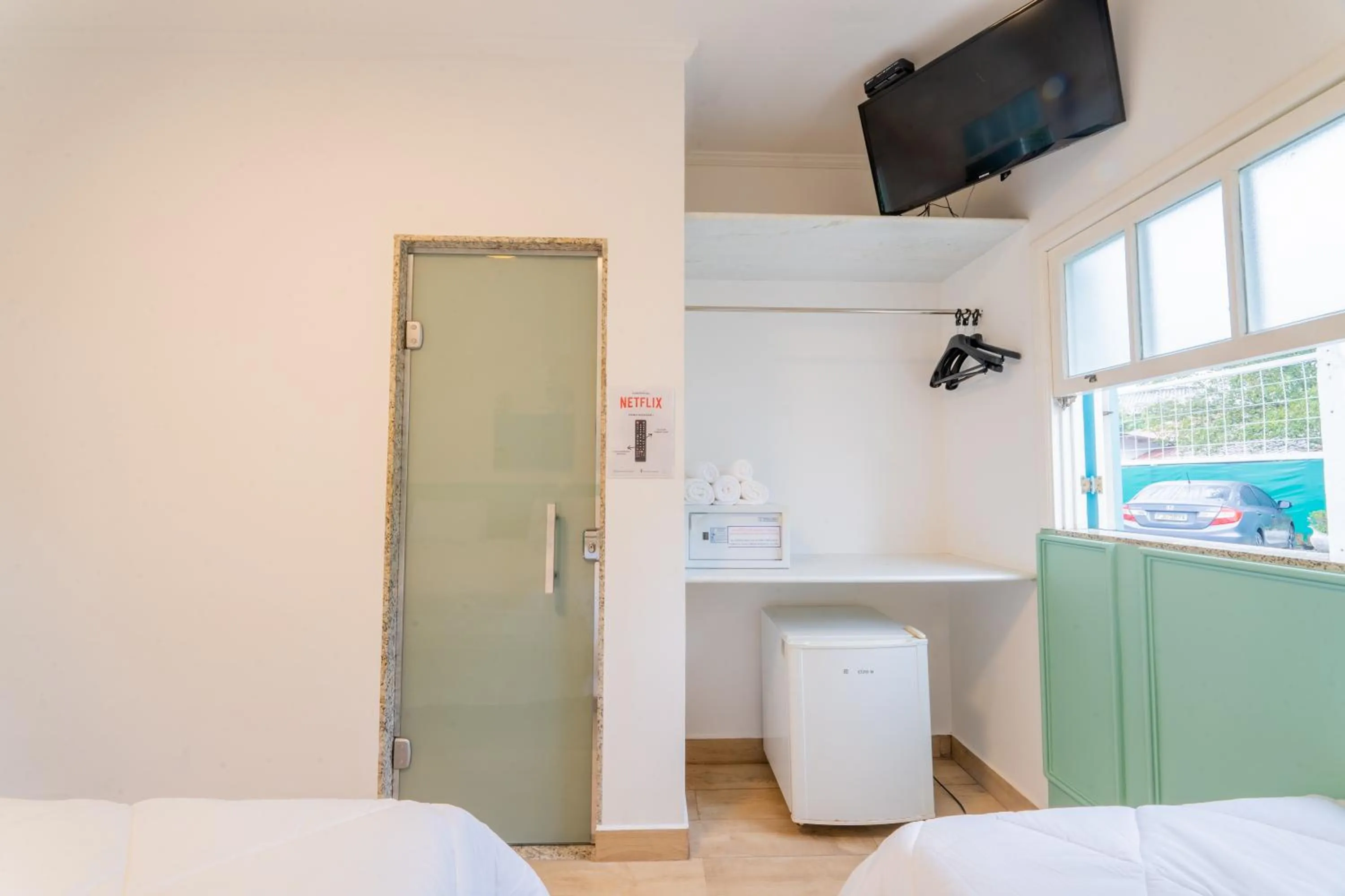 TV and multimedia, Bed in Pousada Cabore