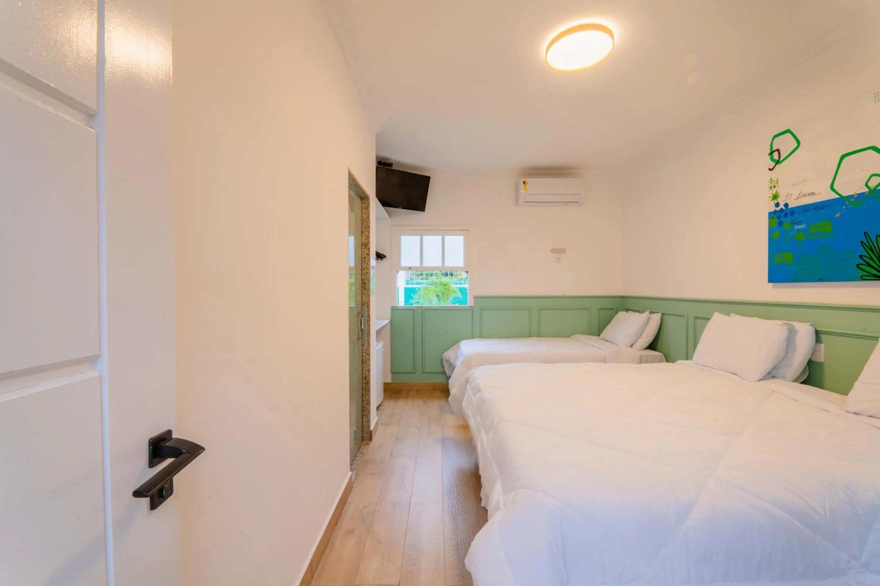 TV and multimedia, Bed in Pousada Cabore