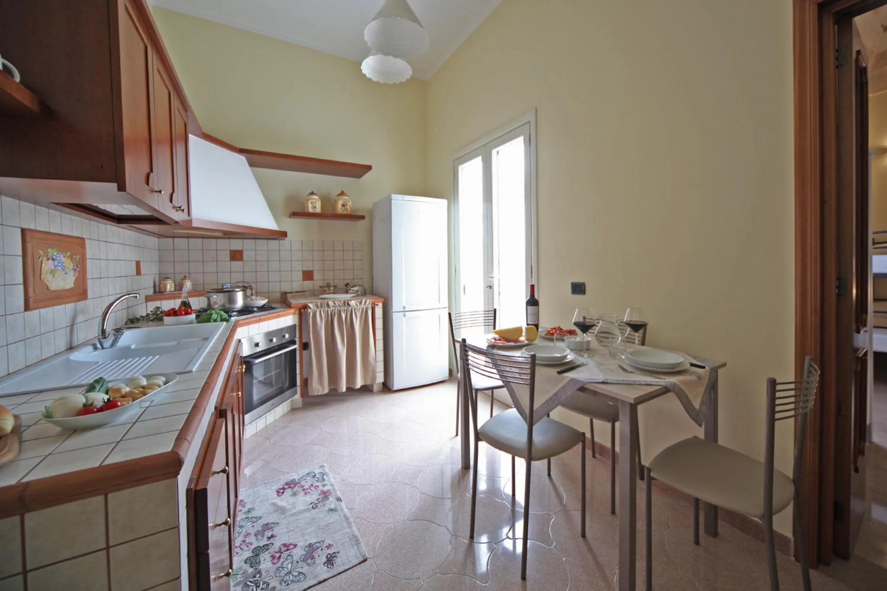 Kitchen or kitchenette in La Buona Creanza by Jdvacanze