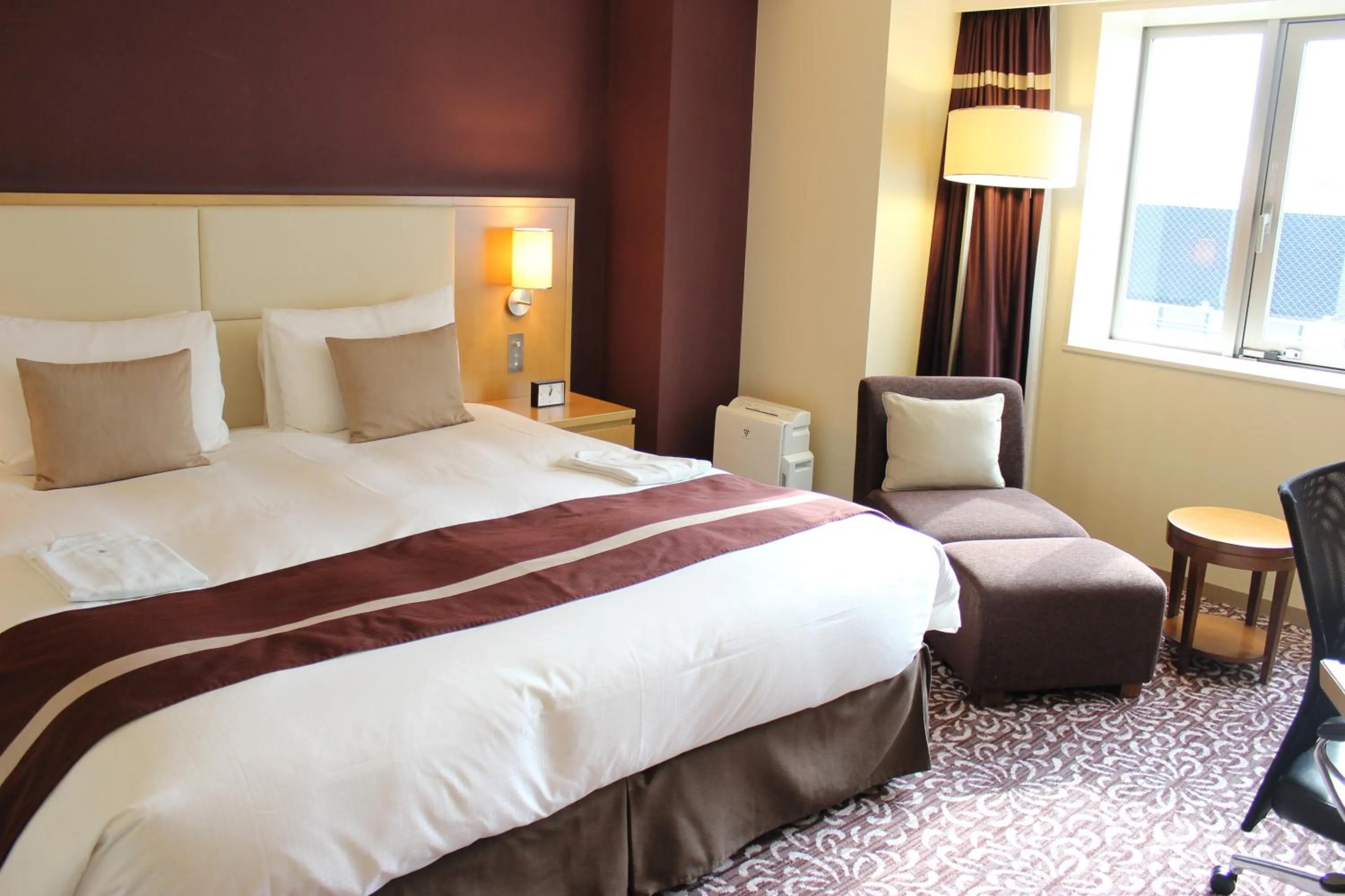 Bed in Hotel Ryumeikan Tokyo