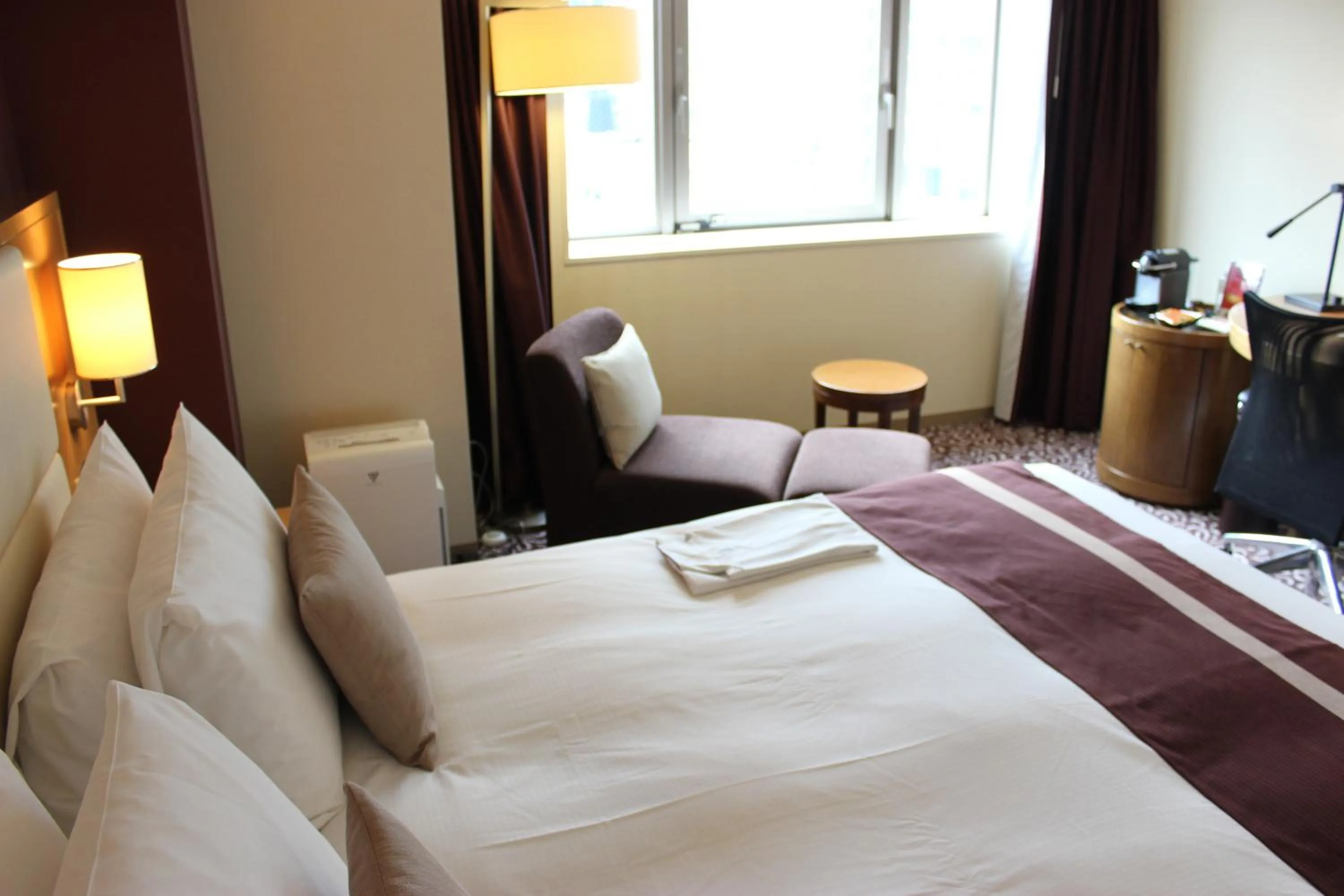 Bed in Hotel Ryumeikan Tokyo