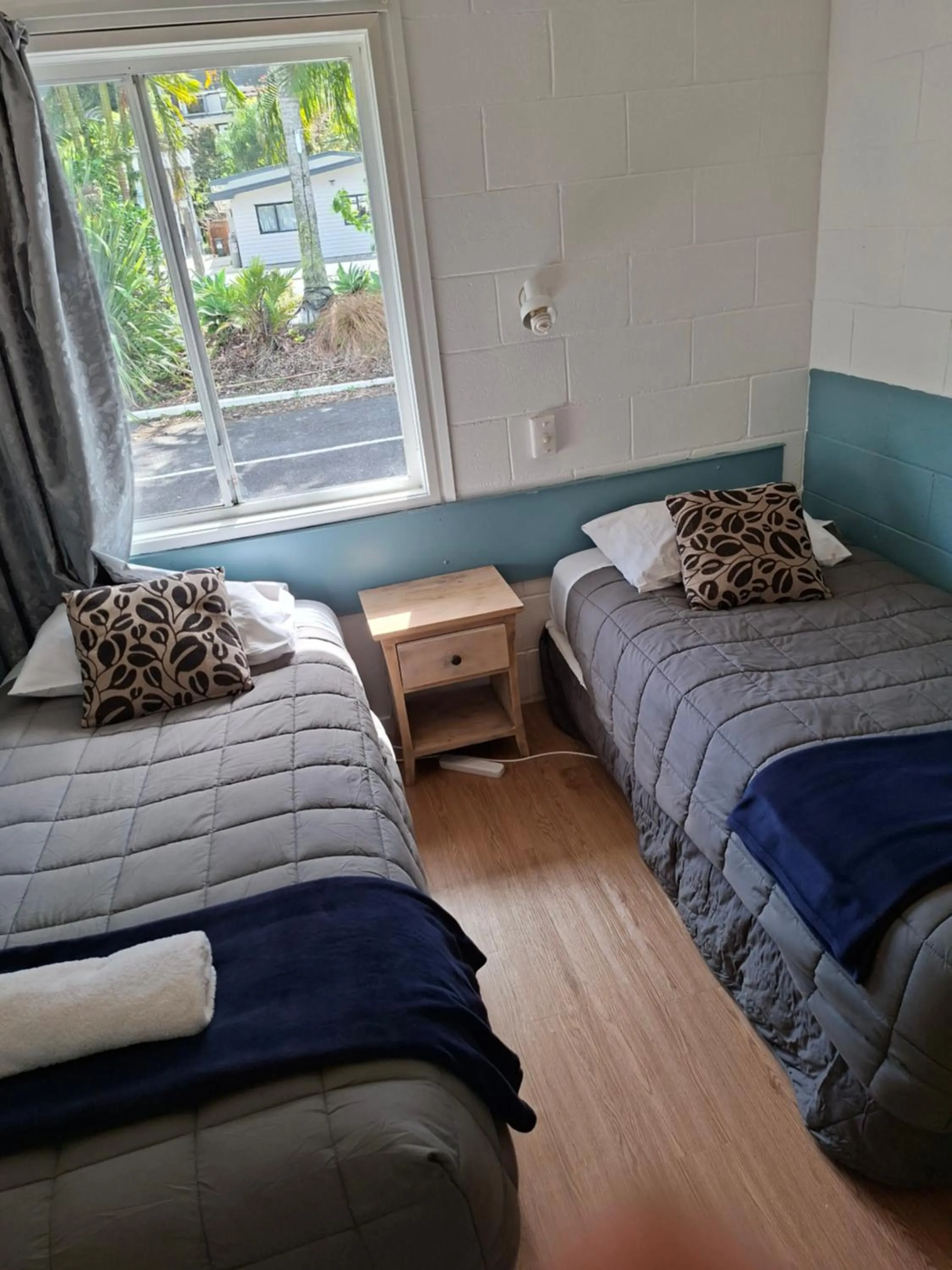 Bed in Aarangi Tui Motel