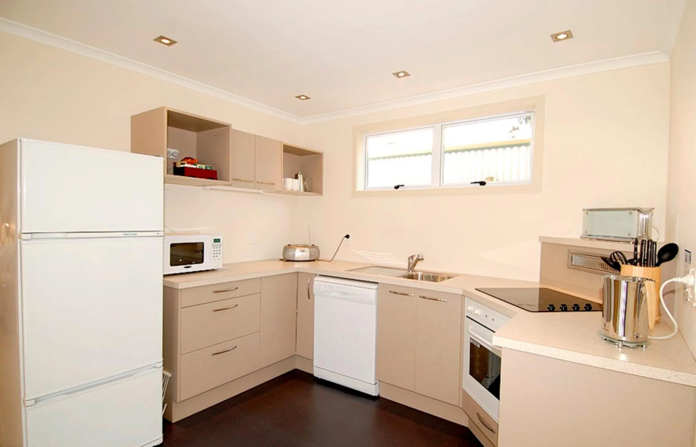 Kitchen or kitchenette in Marineland Beachfront Accommodation