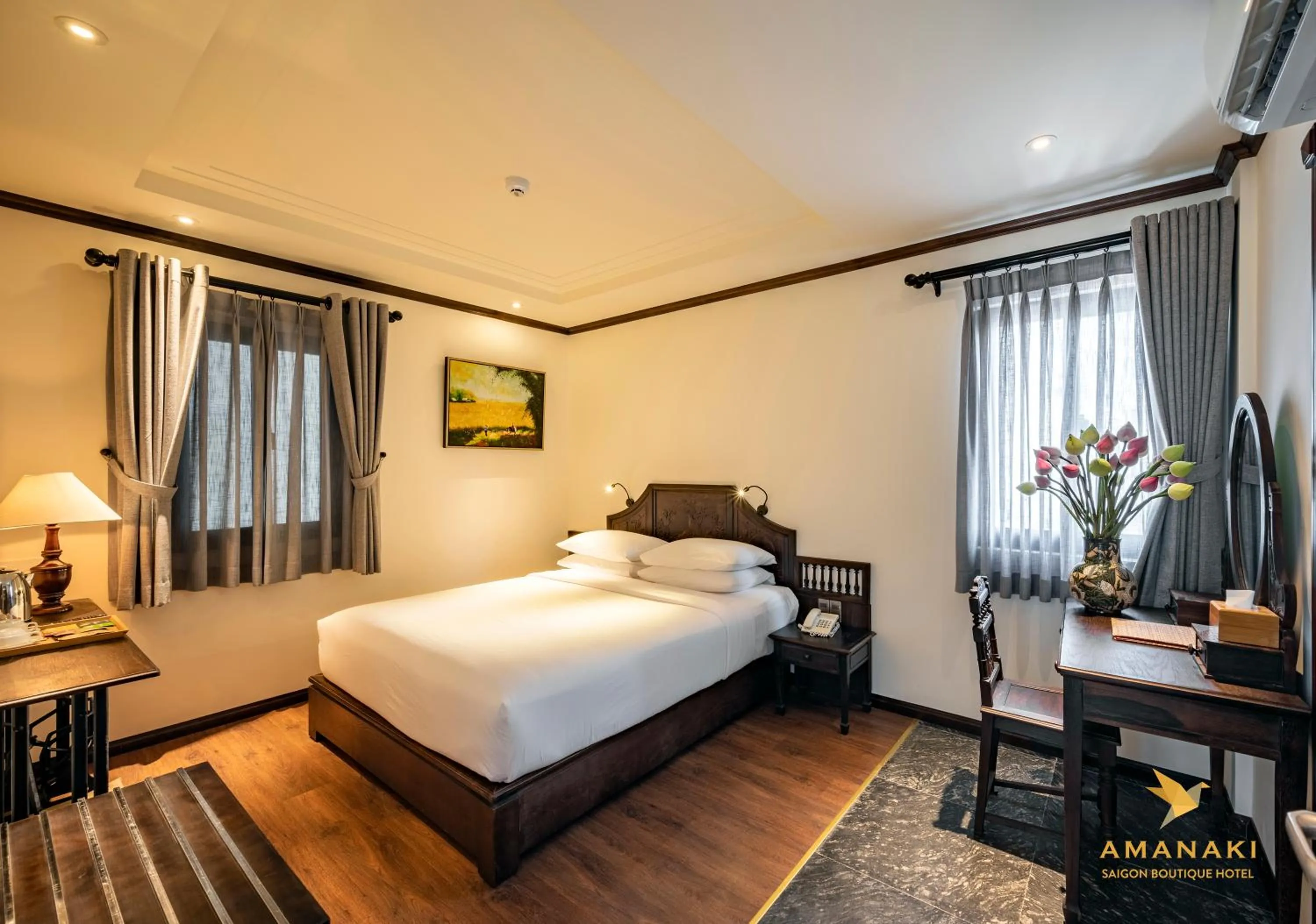 Photo of the whole room, Bed in Amanaki Saigon Boutique Hotel