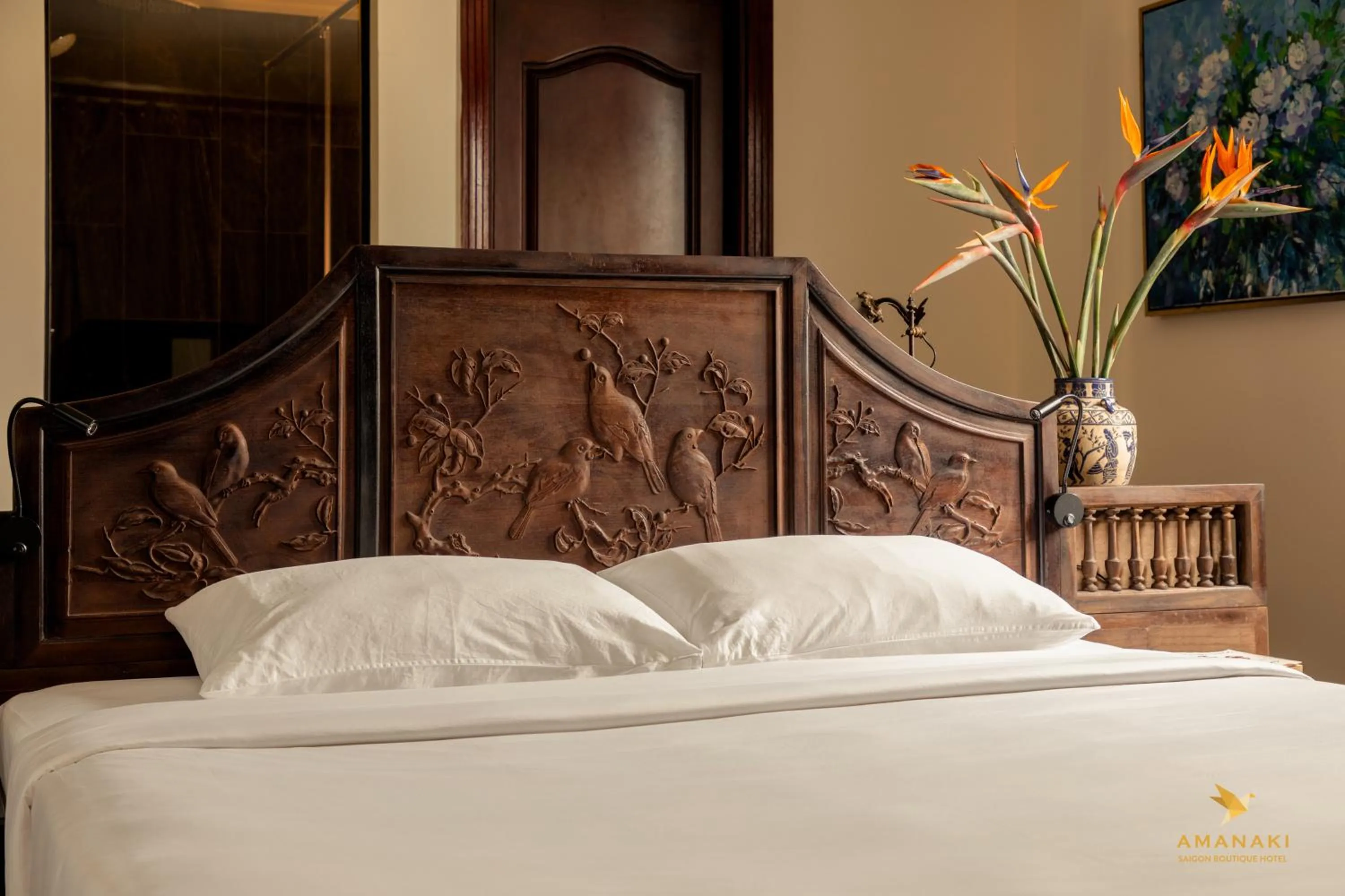 Bed in Amanaki Saigon Boutique Hotel