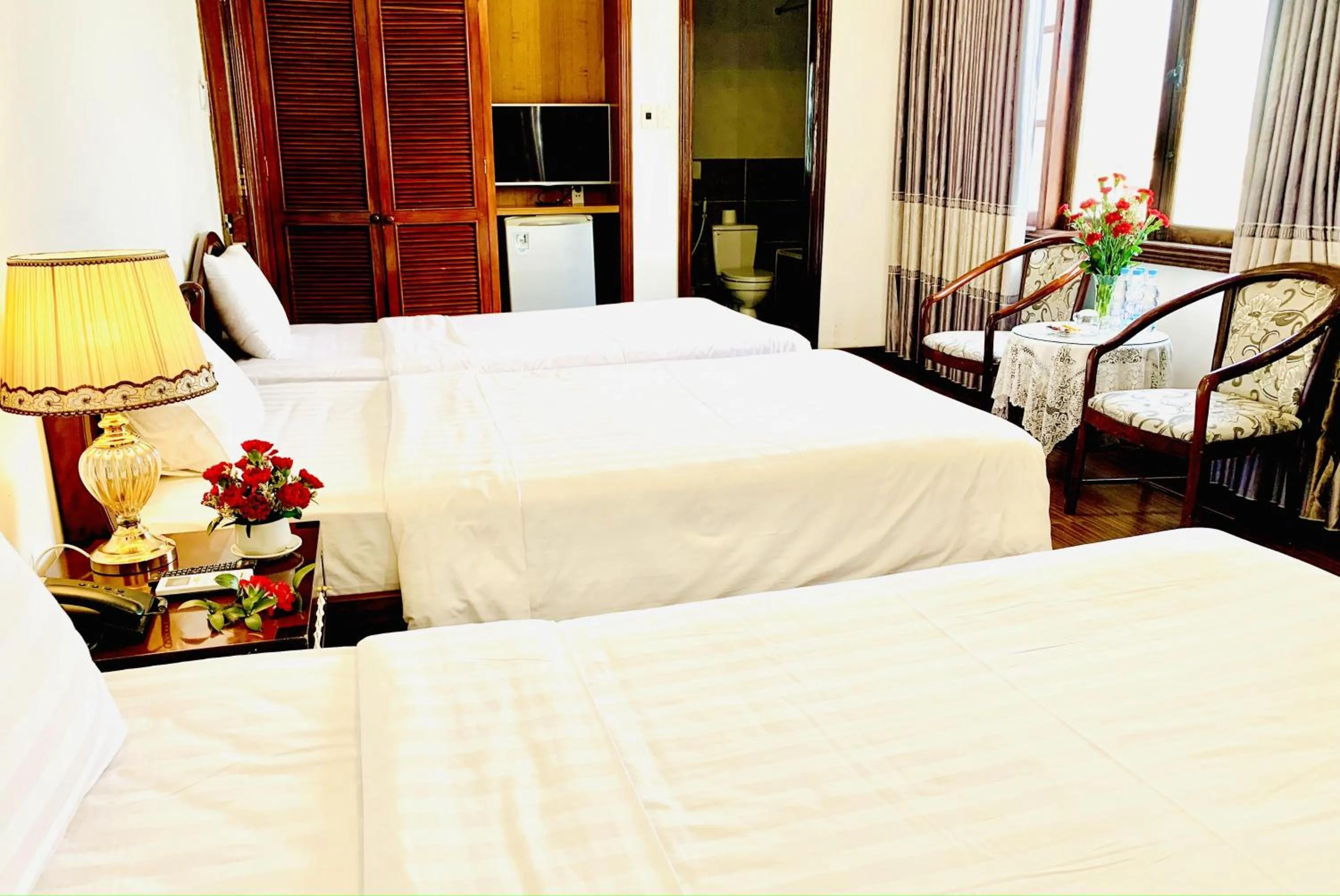 Bed in Cosiana Hue Hotel