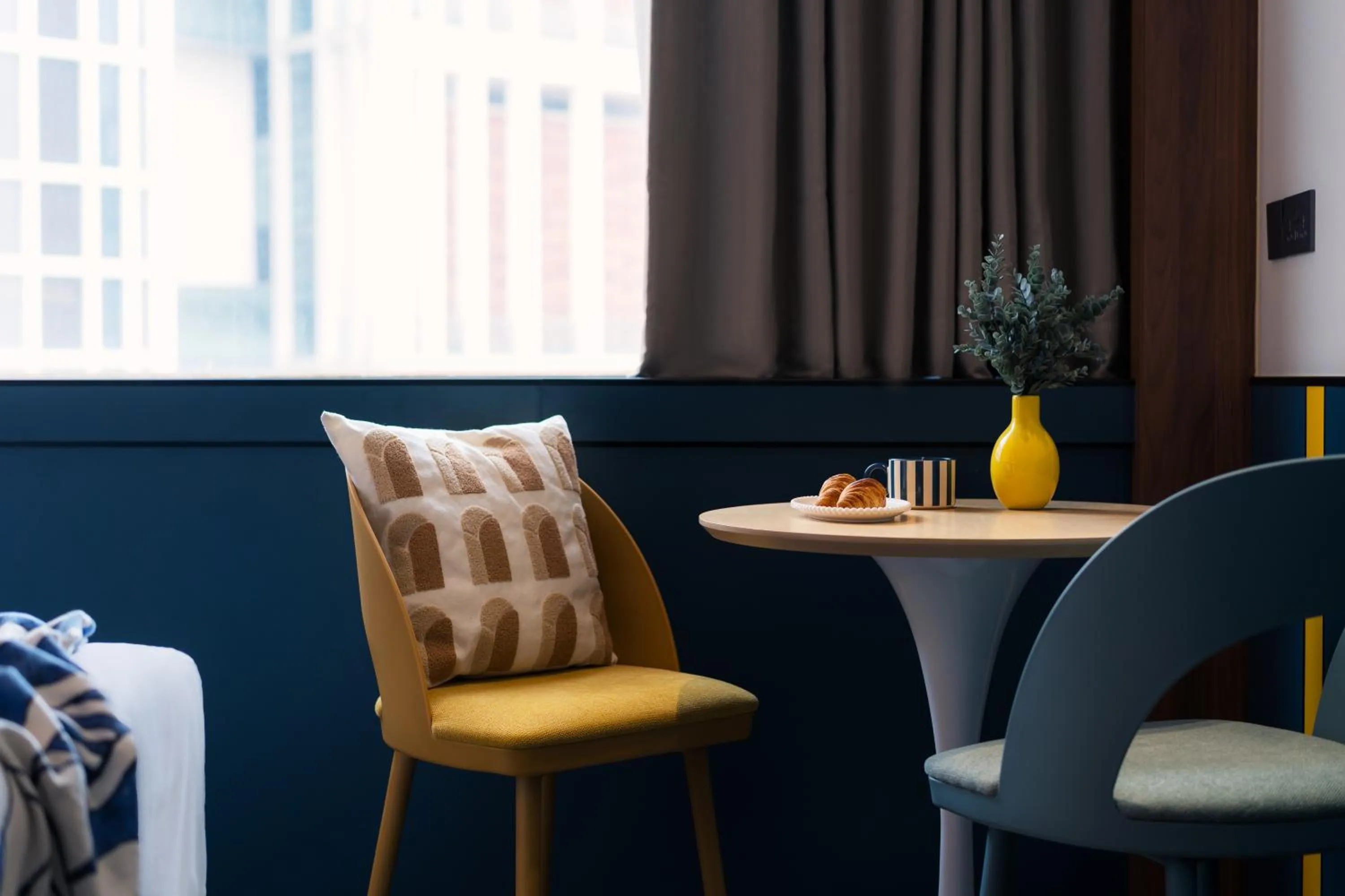 Bedroom in Furama City Centre