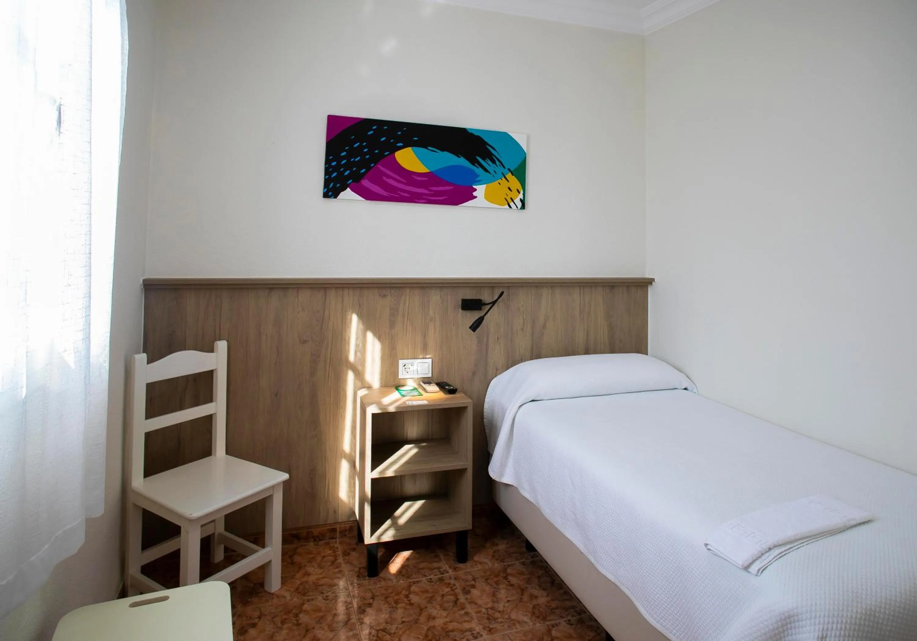 Bed in Pensión Dulces Sueños