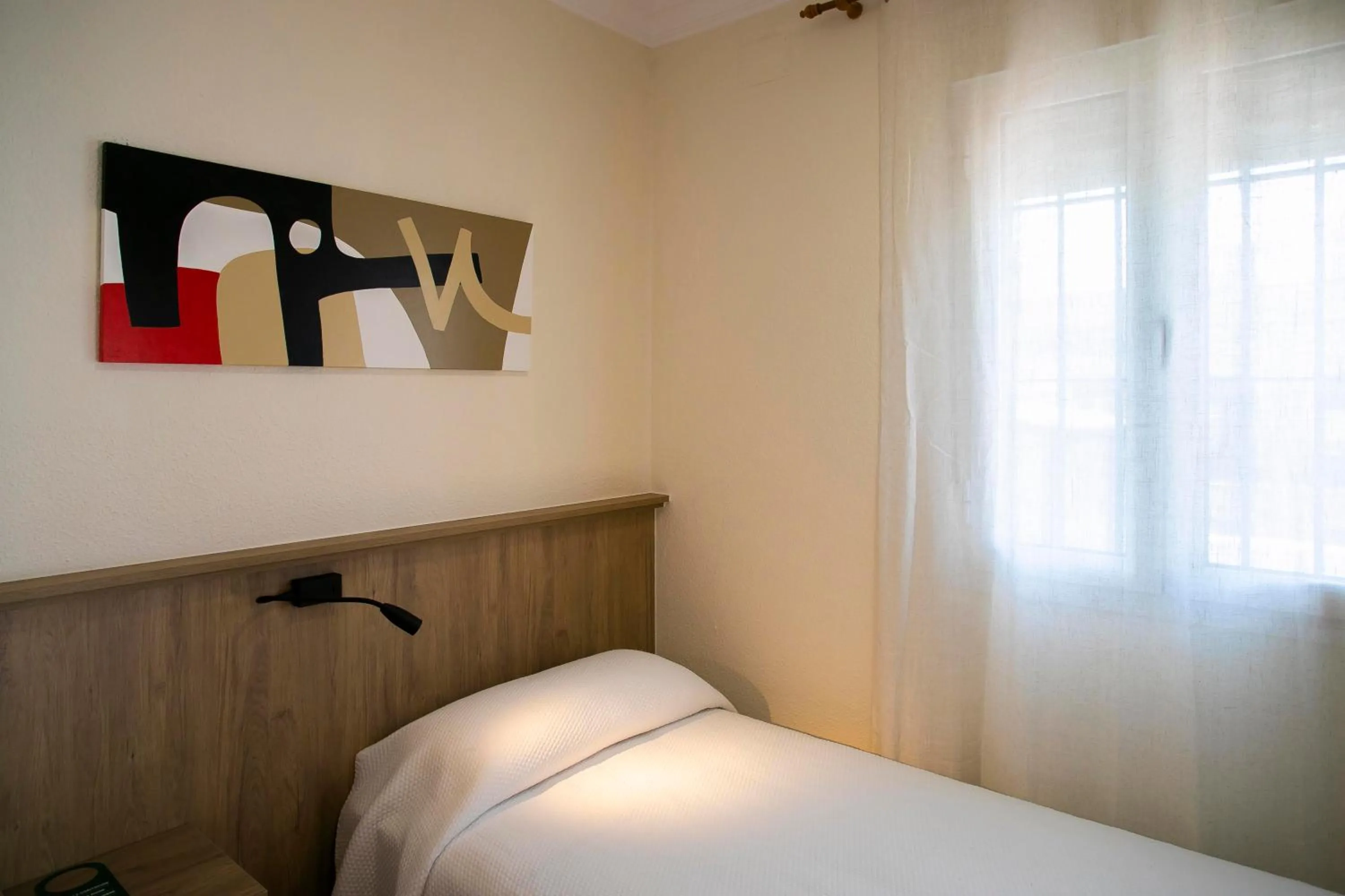 Bed in Pensión Dulces Sueños