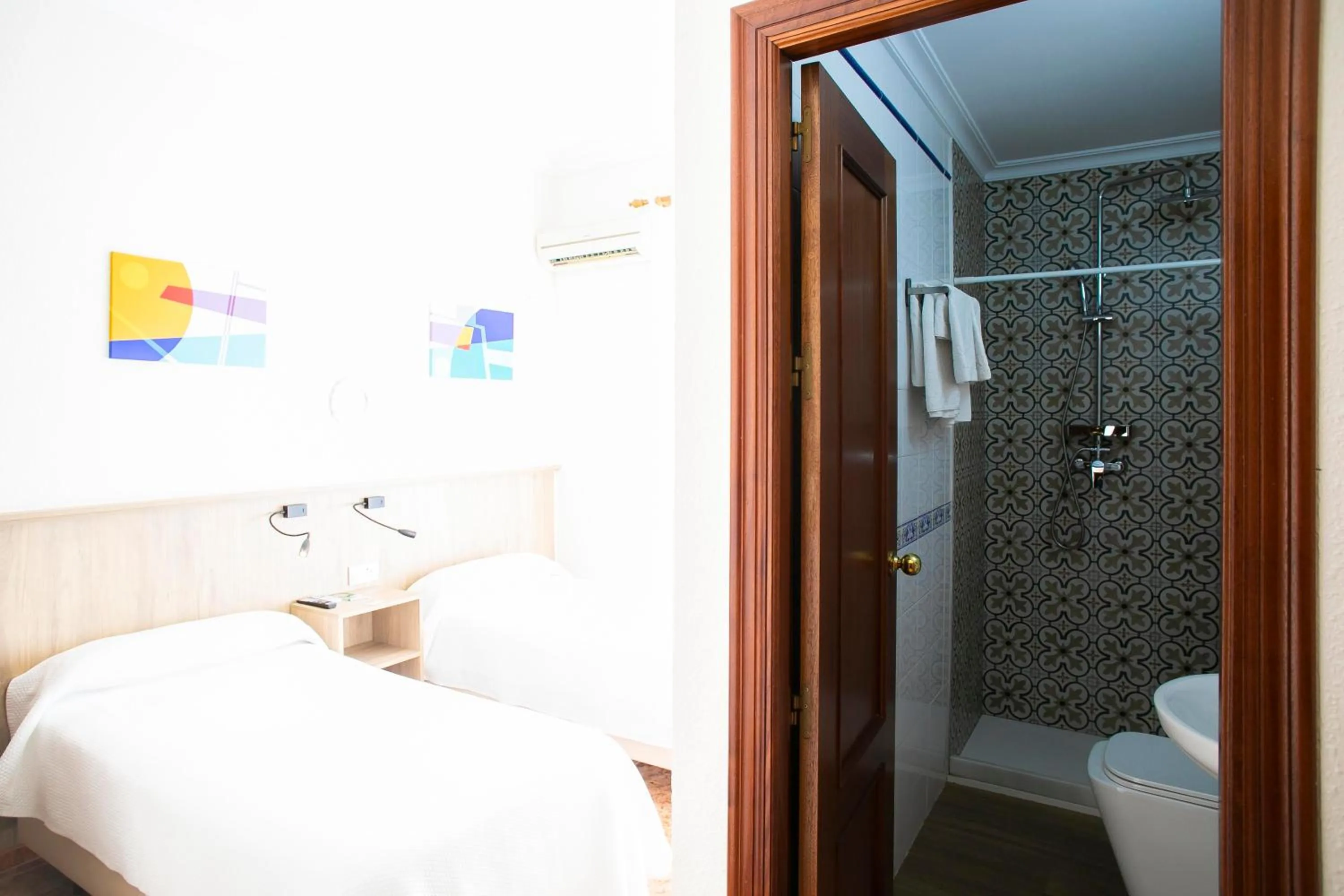 Bed in Pensión Dulces Sueños