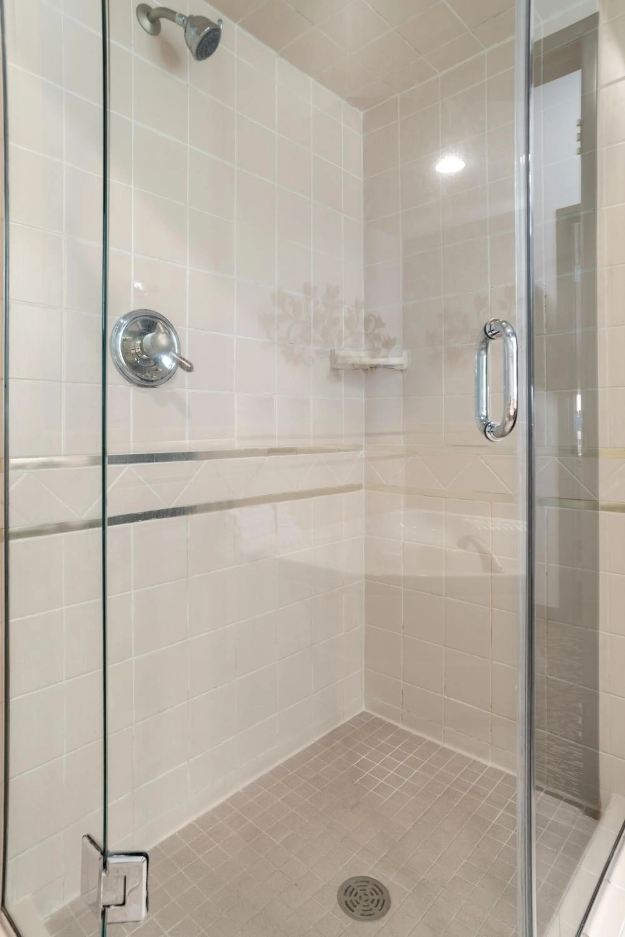 Shower in Elevation Inn & Suites, Trademark Collection by Wyndham