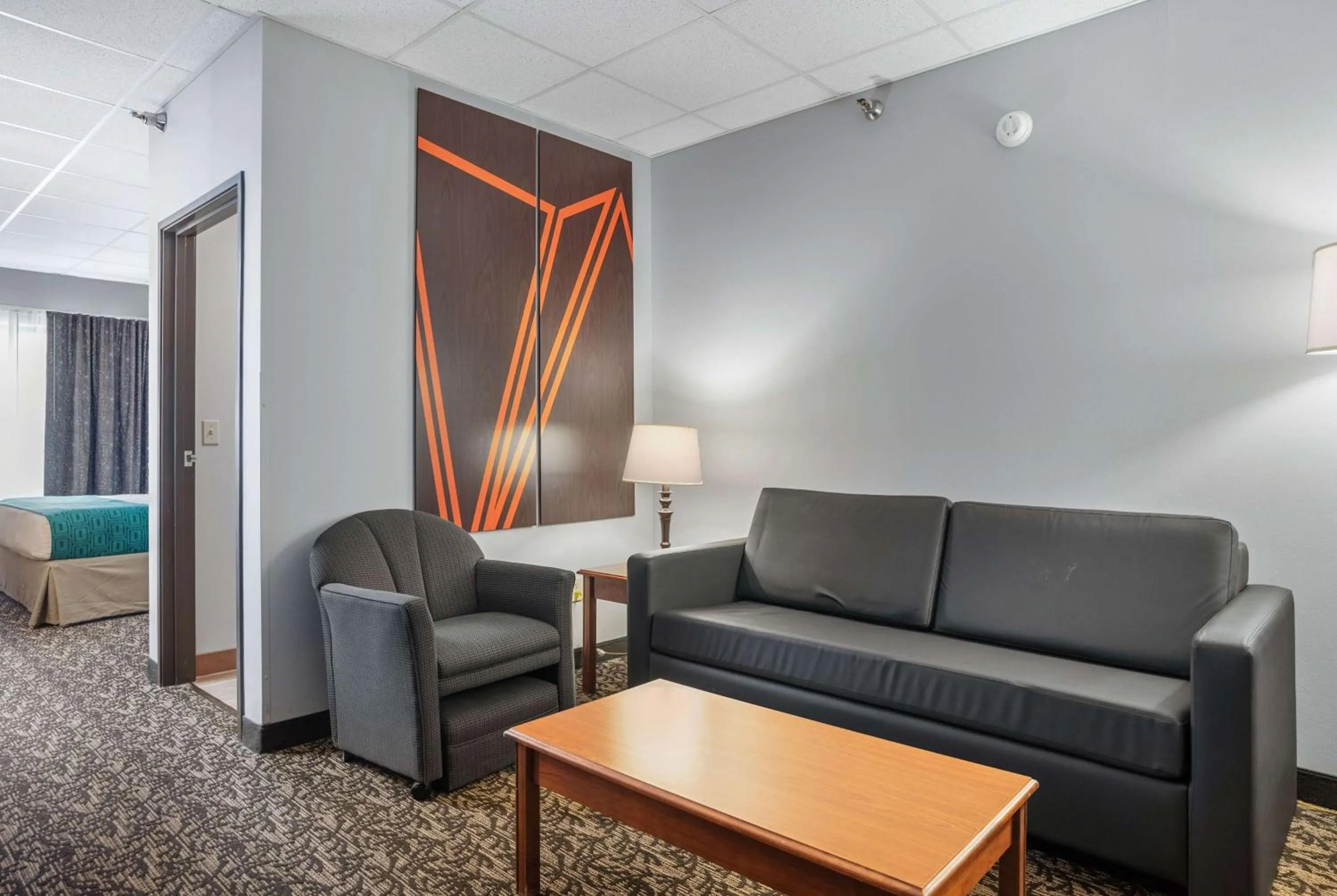 Bed in Elevation Inn & Suites, Trademark Collection by Wyndham