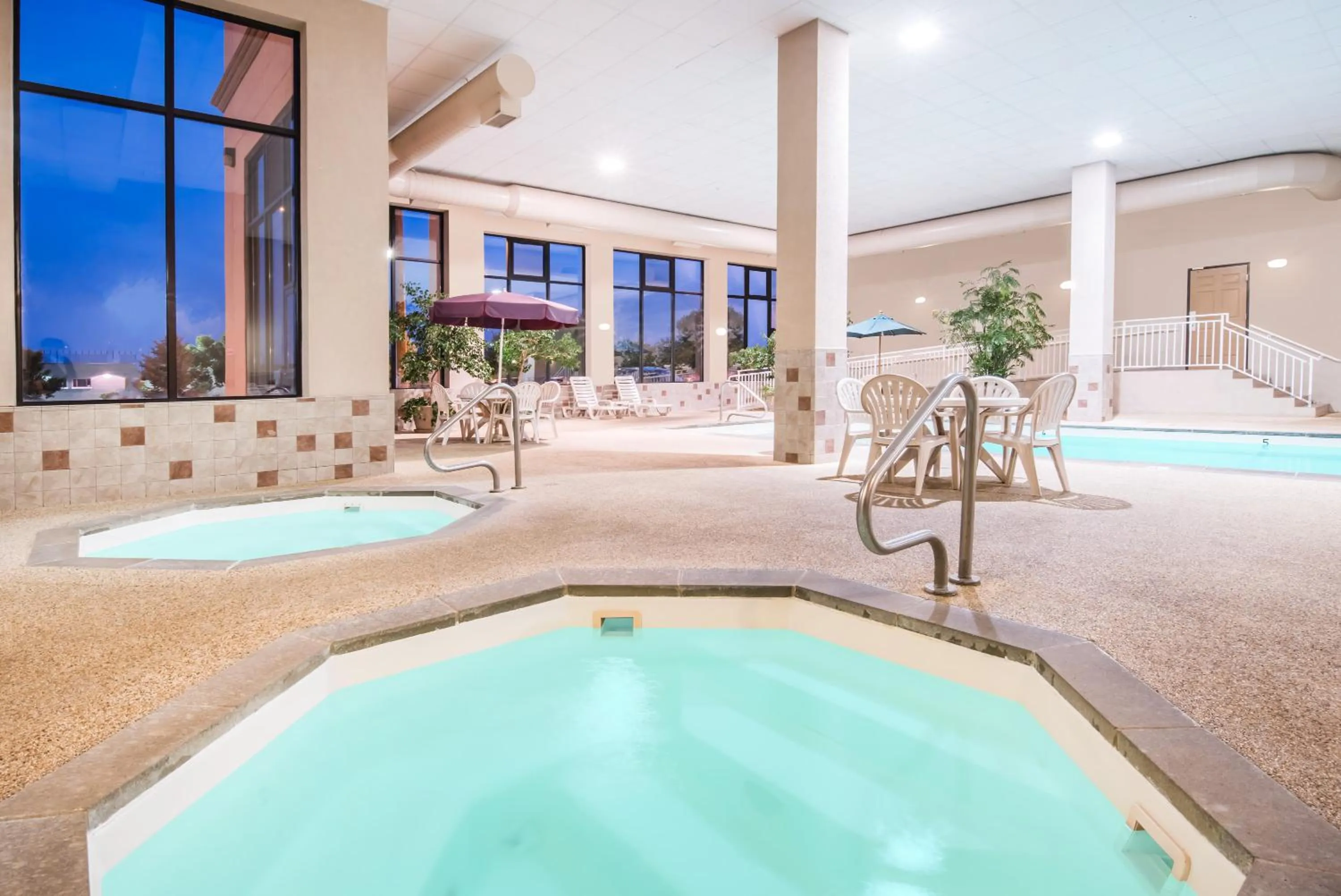 Swimming pool in Elevation Inn & Suites, Trademark Collection by Wyndham