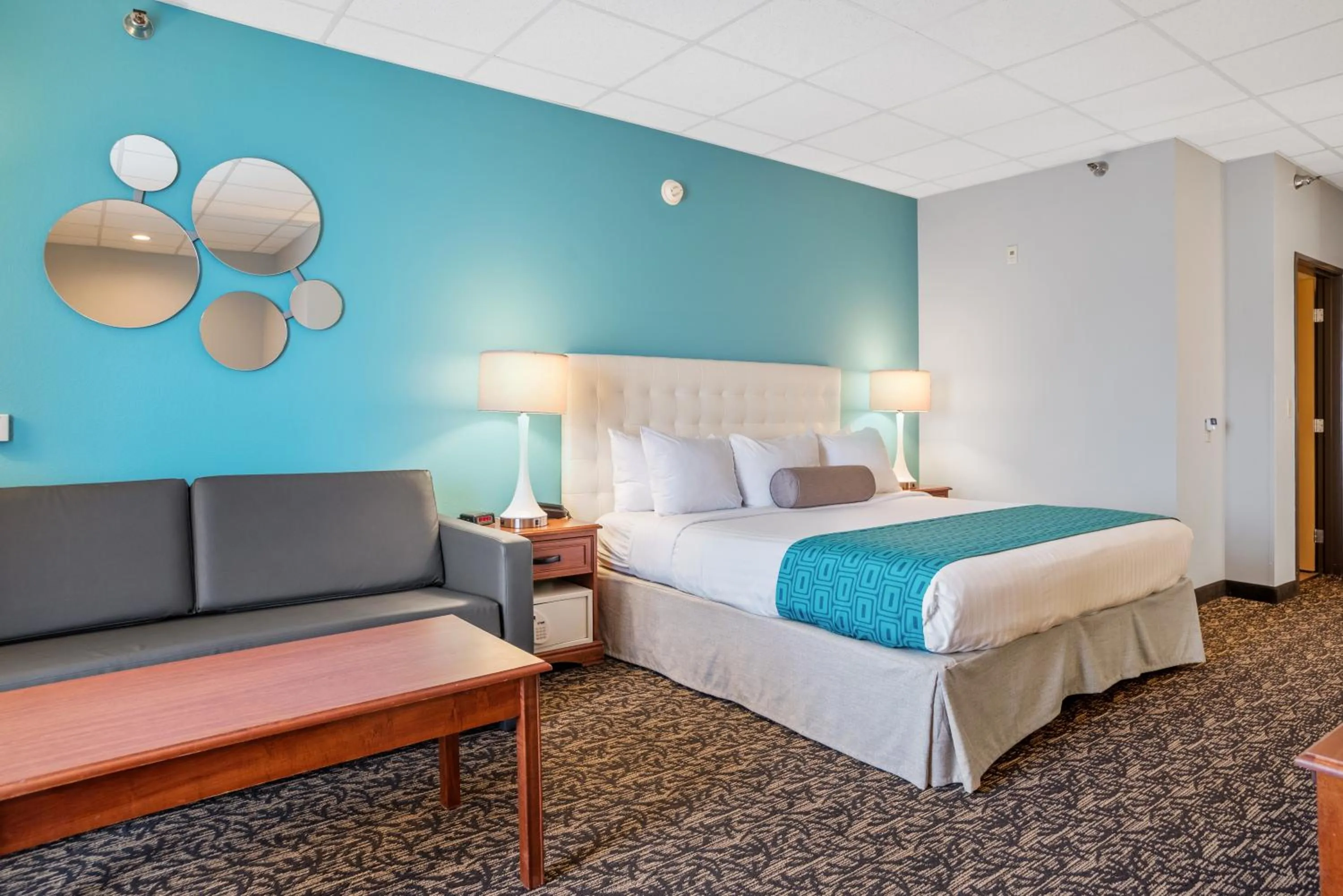 Bed in Elevation Inn & Suites, Trademark Collection by Wyndham