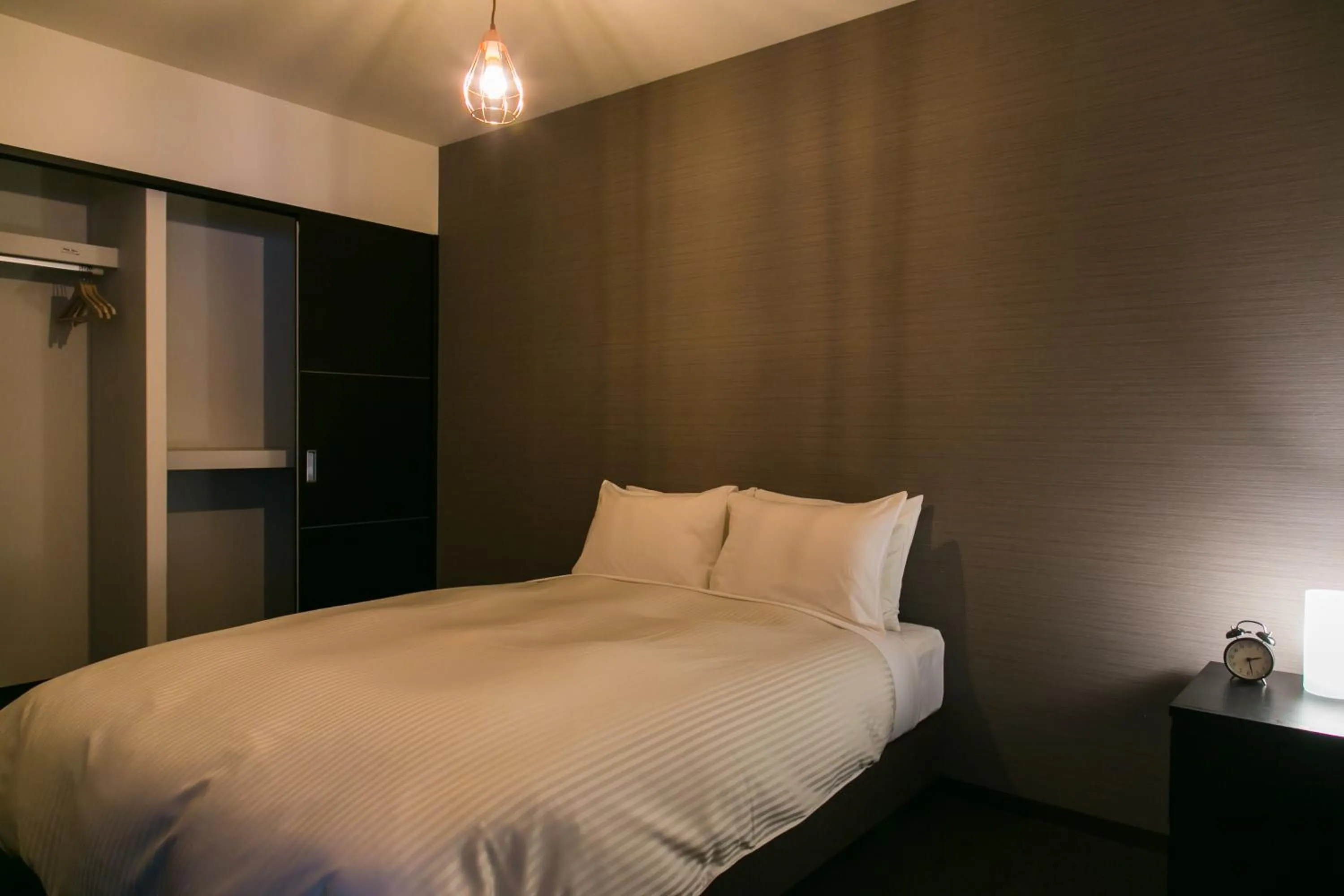 Bed in Kyoto Four Sisters Residence