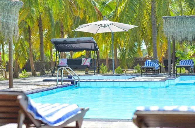 Swimming pool in De Silva Palm Resort