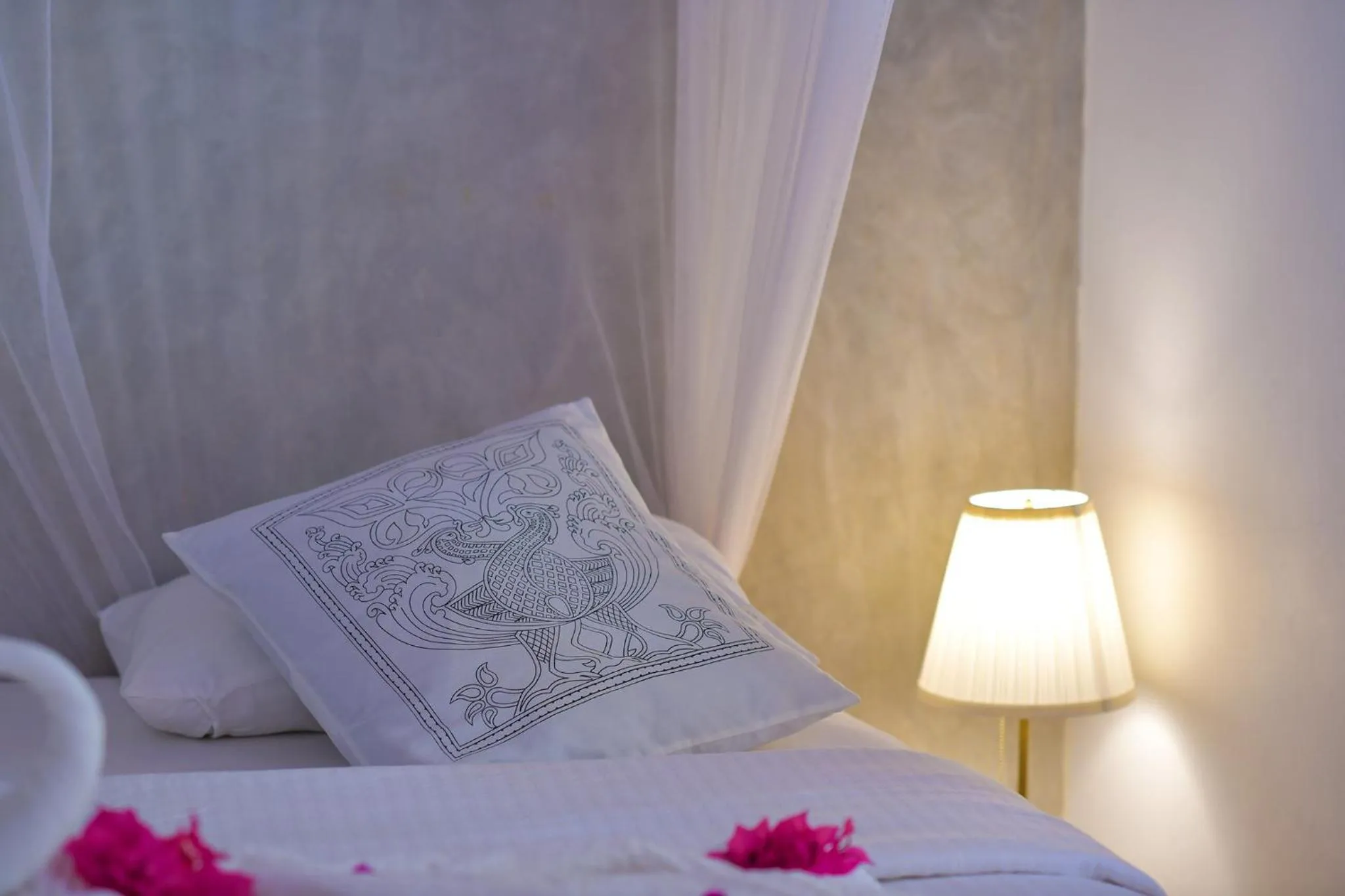 Bed in De Silva Palm Resort