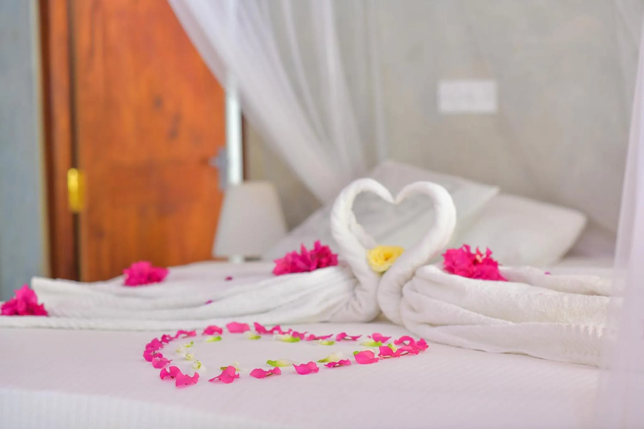 Bed in De Silva Palm Resort