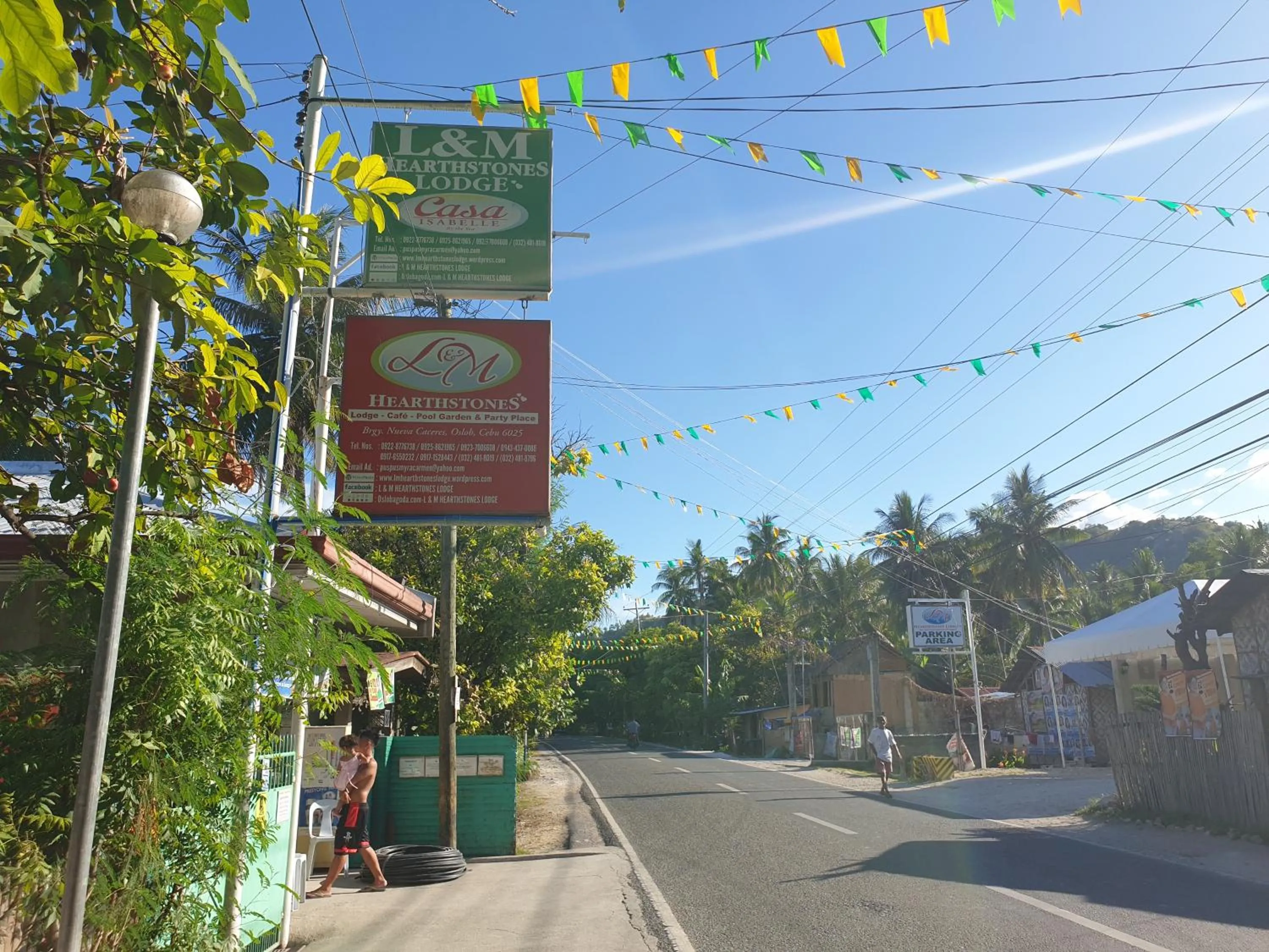 Property logo or sign in L & M Hearthstones Lodge