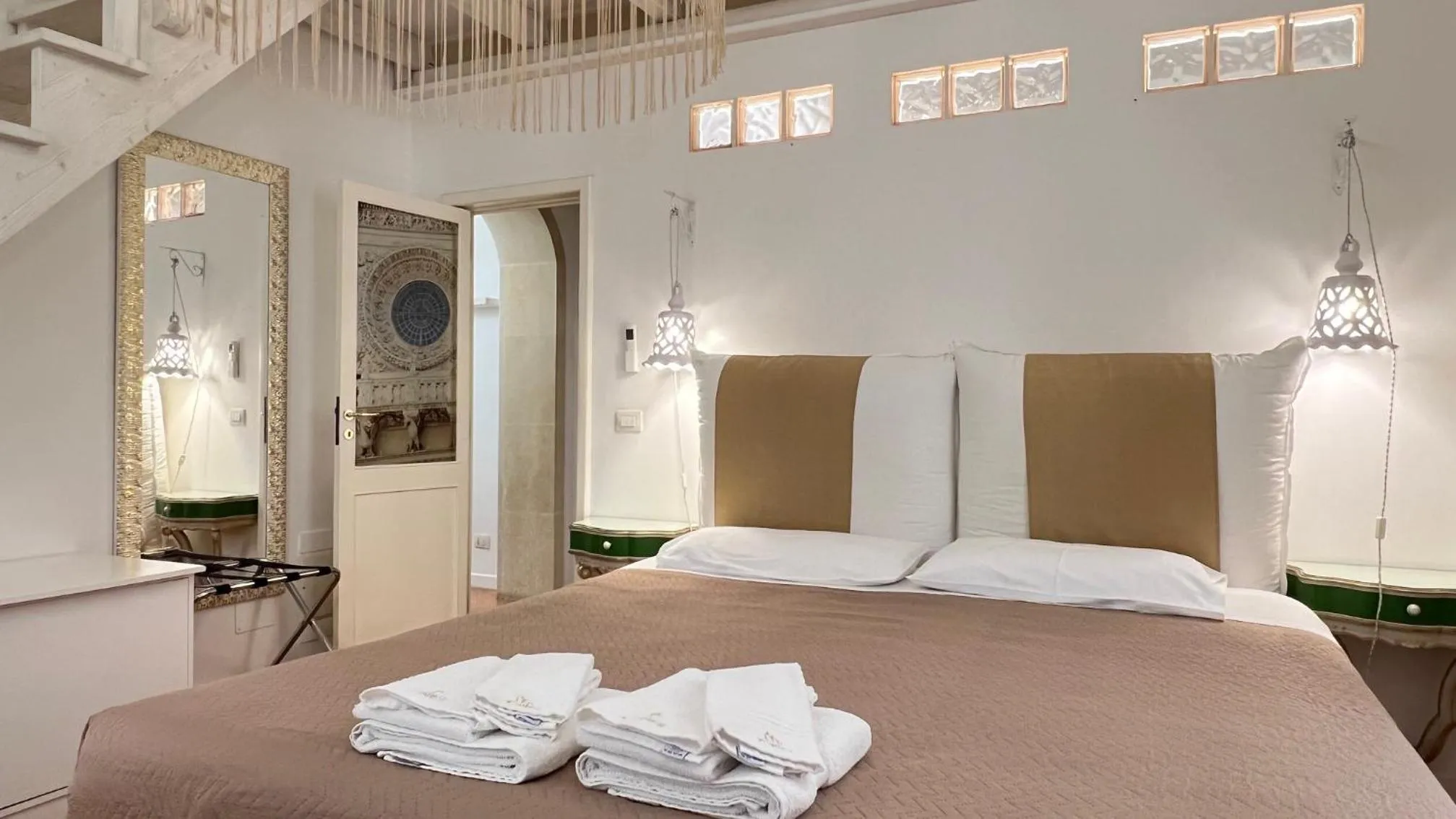 Bed in Cadelli Luxury Suite & Apartments