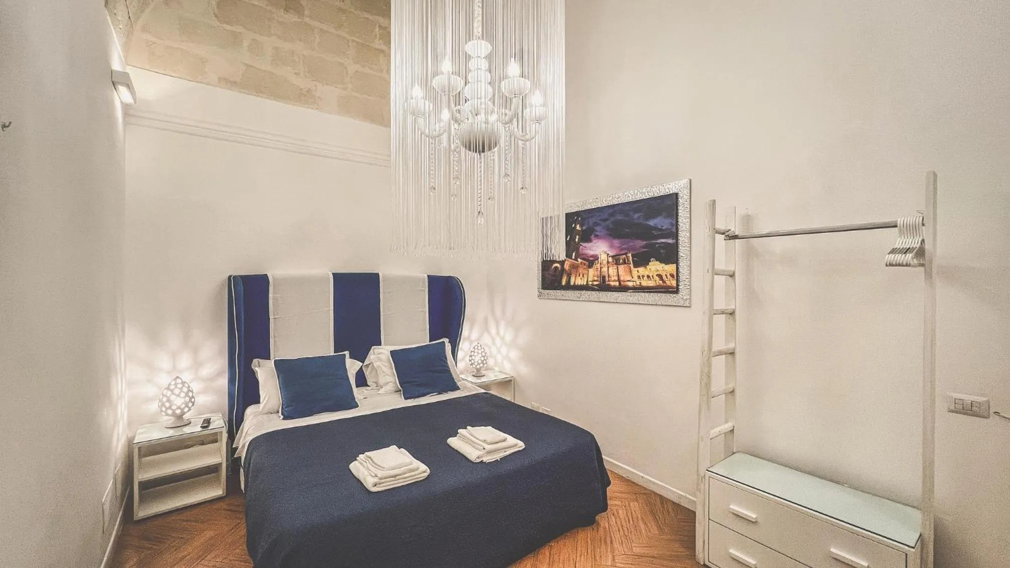 Bed in Cadelli Luxury Suite & Apartments