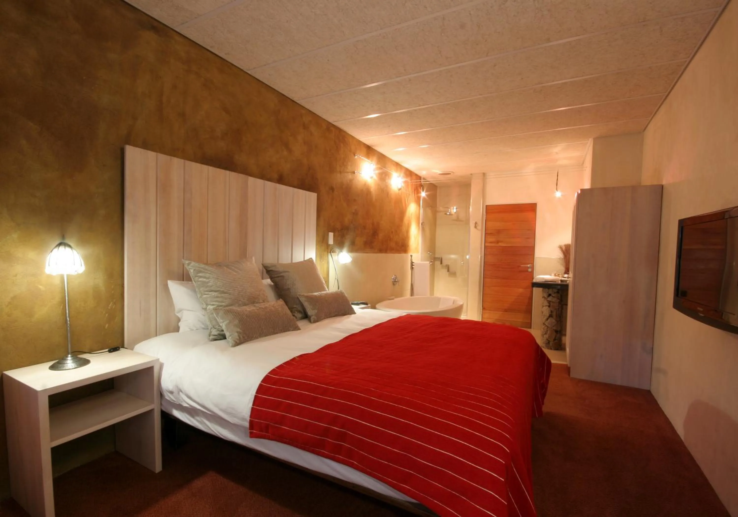 Photo of the whole room, Bed in African Rock Hotel & Spa, a "Boutique Lifestyle Resort"
