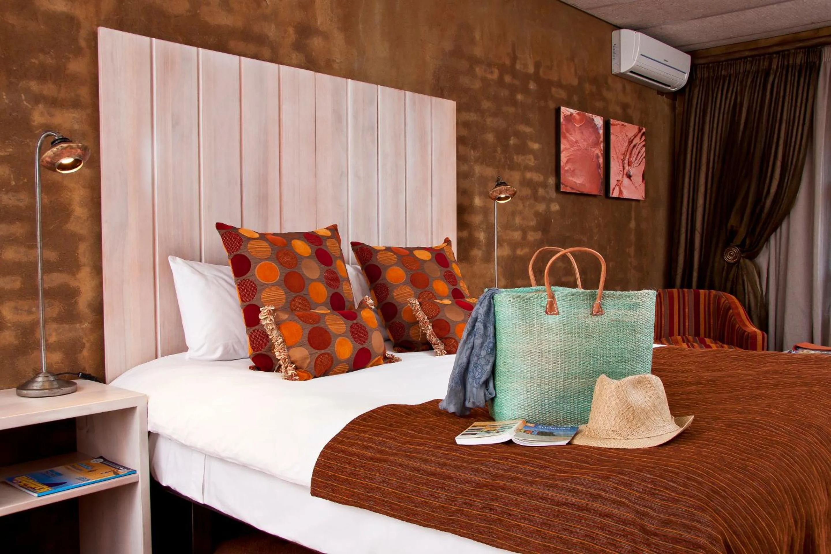 Bed in African Rock Hotel & Spa, a "Boutique Lifestyle Resort"