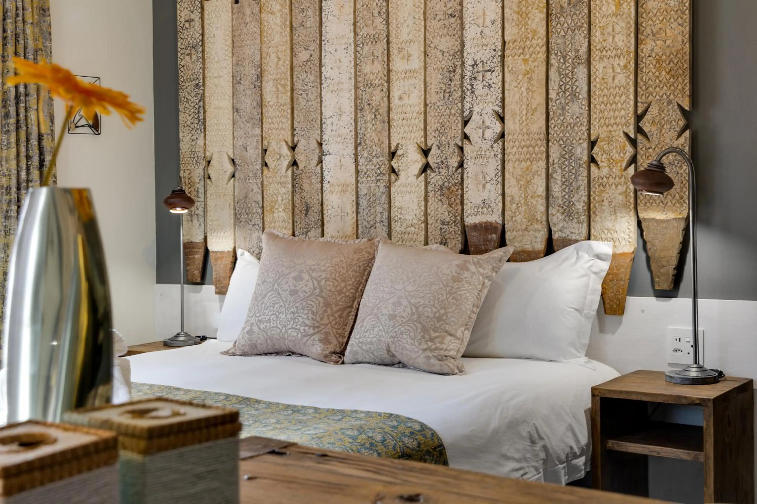 Bed in African Rock Hotel & Spa, a "Boutique Lifestyle Resort"