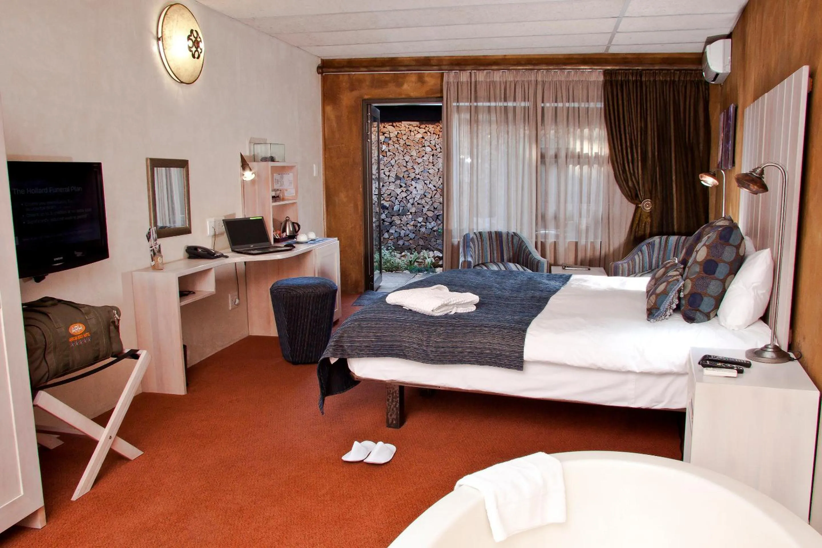 Bed in African Rock Hotel & Spa, a "Boutique Lifestyle Resort"