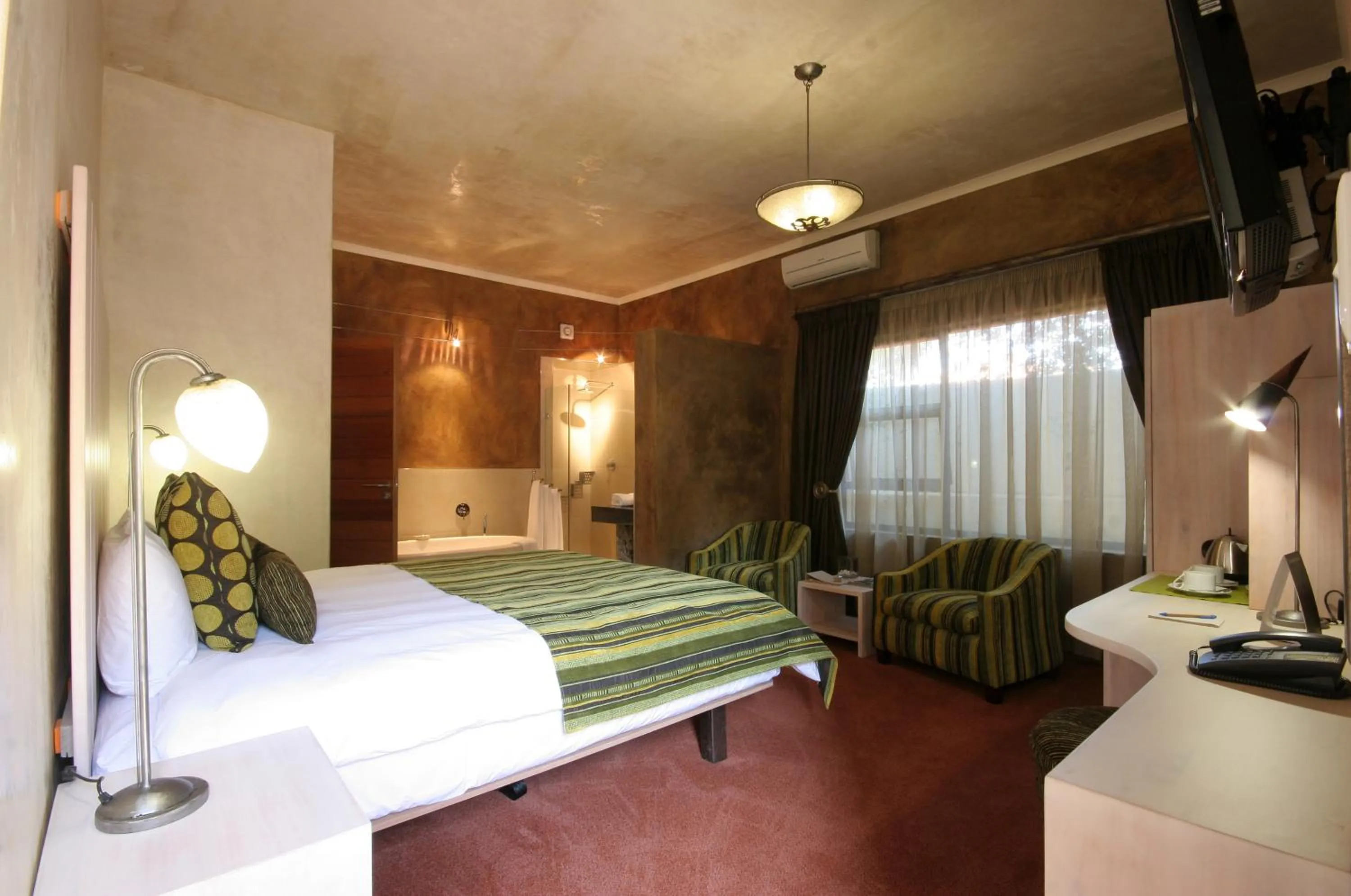 Photo of the whole room, Bed in African Rock Hotel & Spa, a "Boutique Lifestyle Resort"