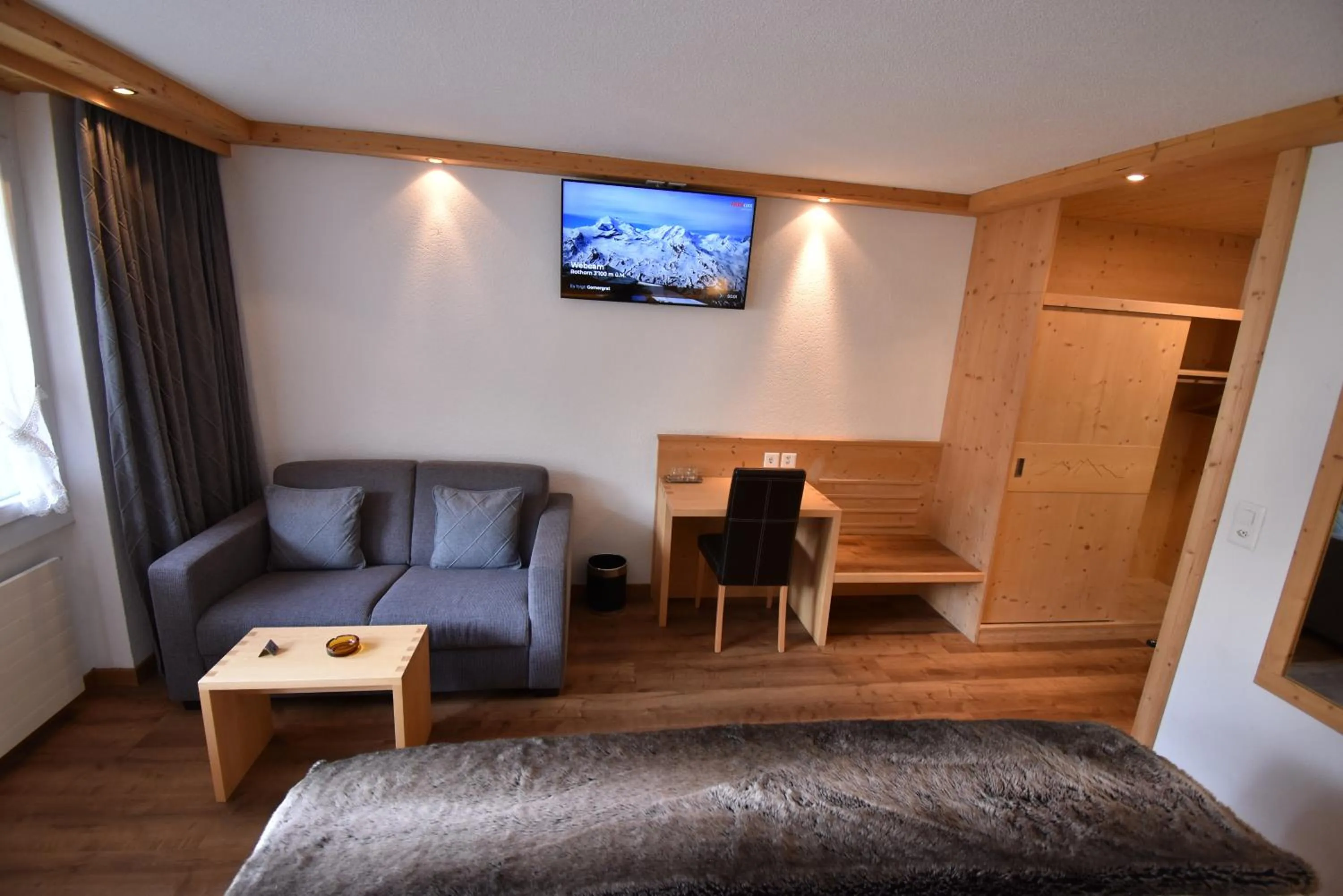 Photo of the whole room, Bed in Hotel Matterhornblick