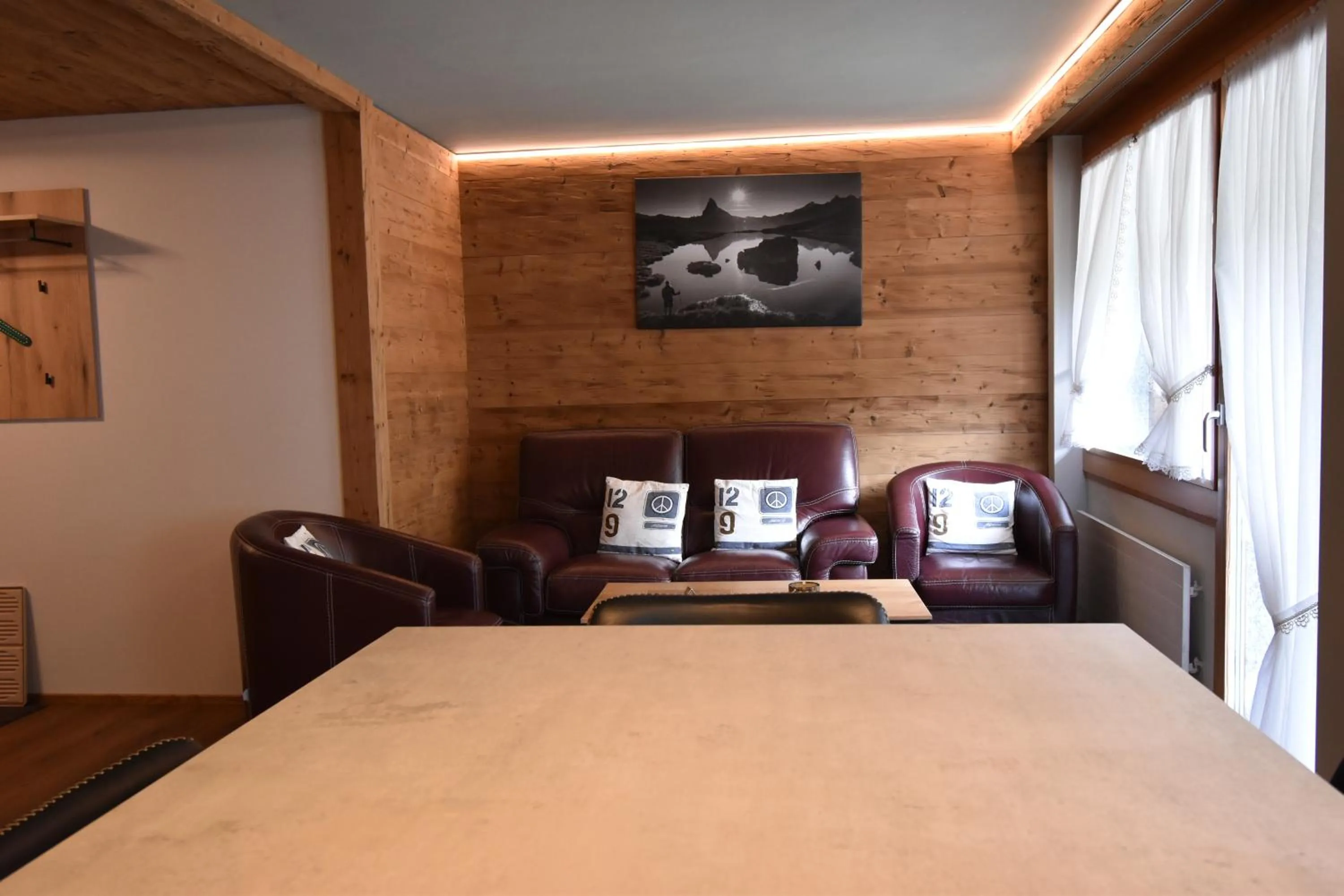 Living room, Bed in Hotel Matterhornblick