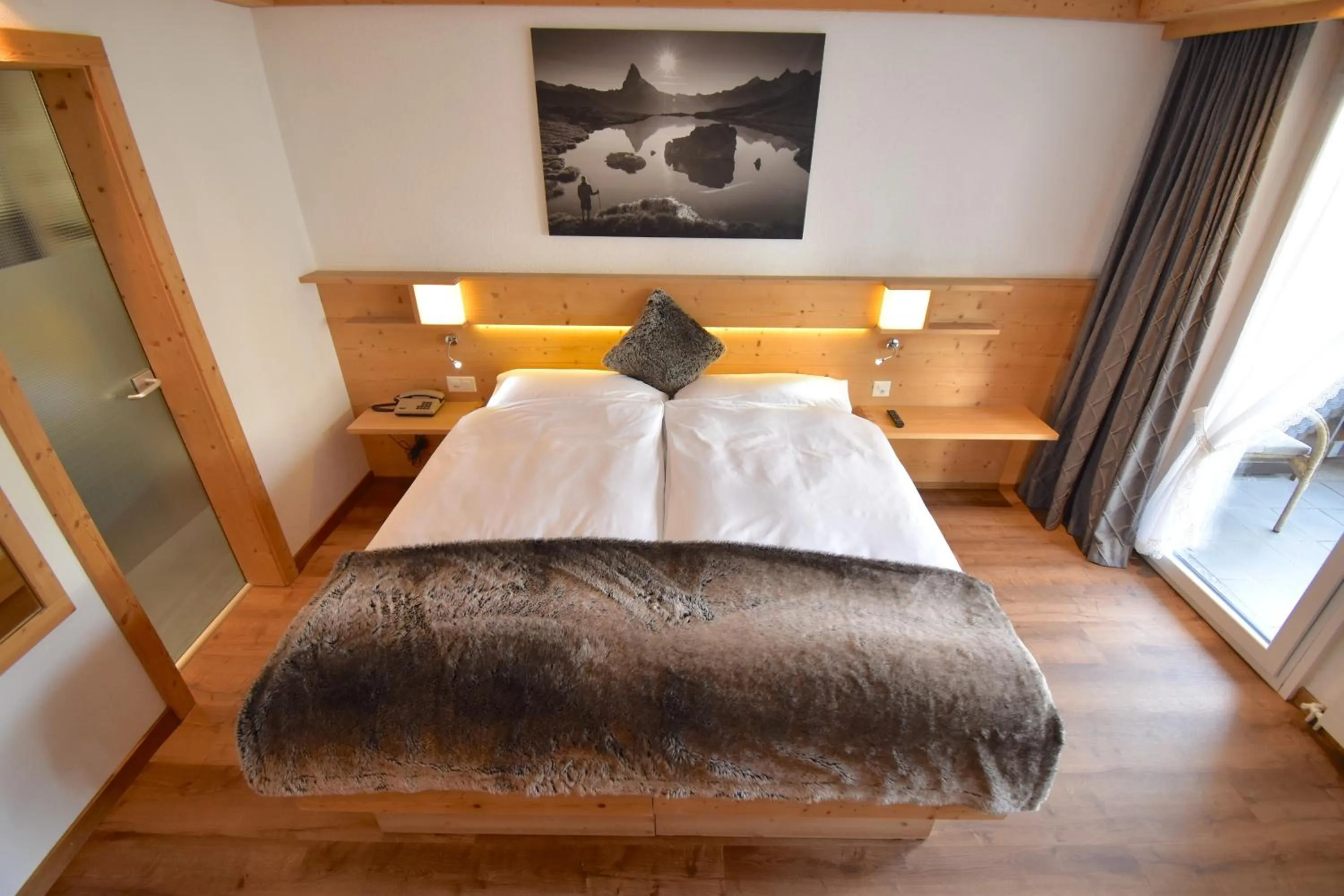 Photo of the whole room, Bed in Hotel Matterhornblick