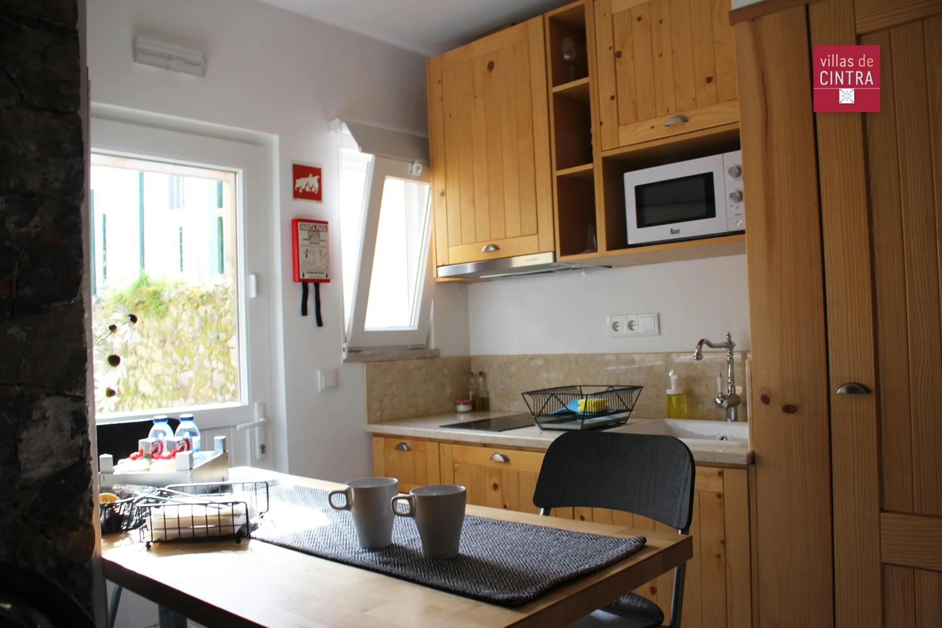 Kitchen or kitchenette in Villas de Cintra