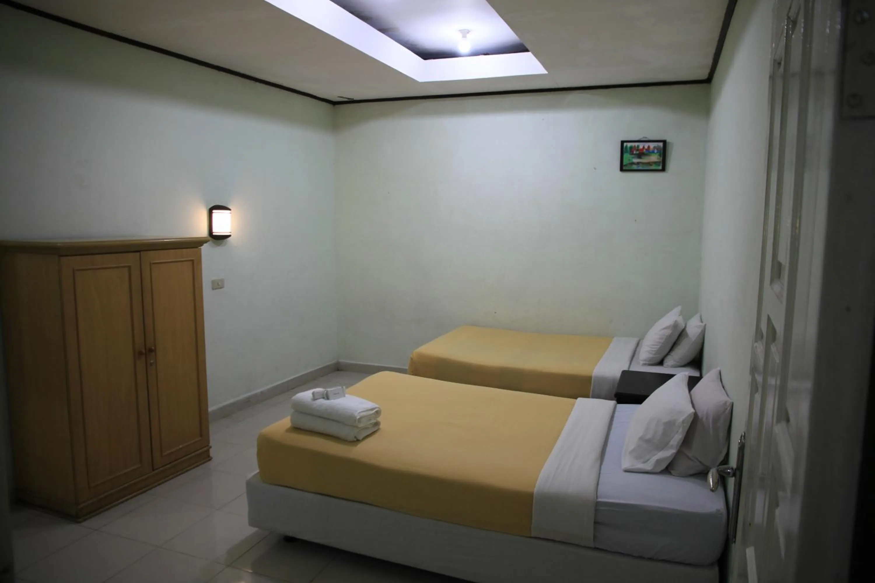 Bed in Pandu Lakeside Hotel Parapat