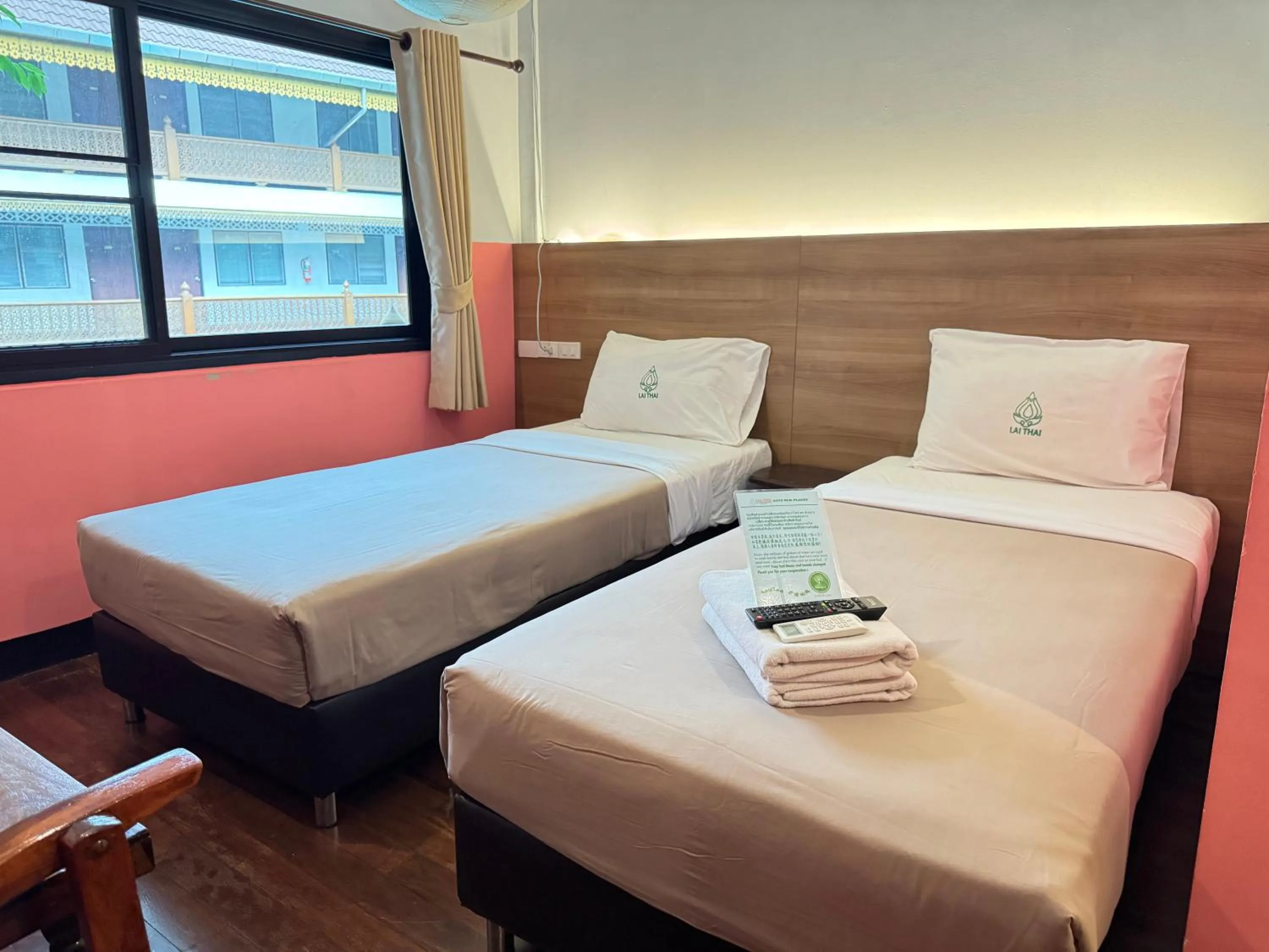 Bed in Lai Thai Guest House