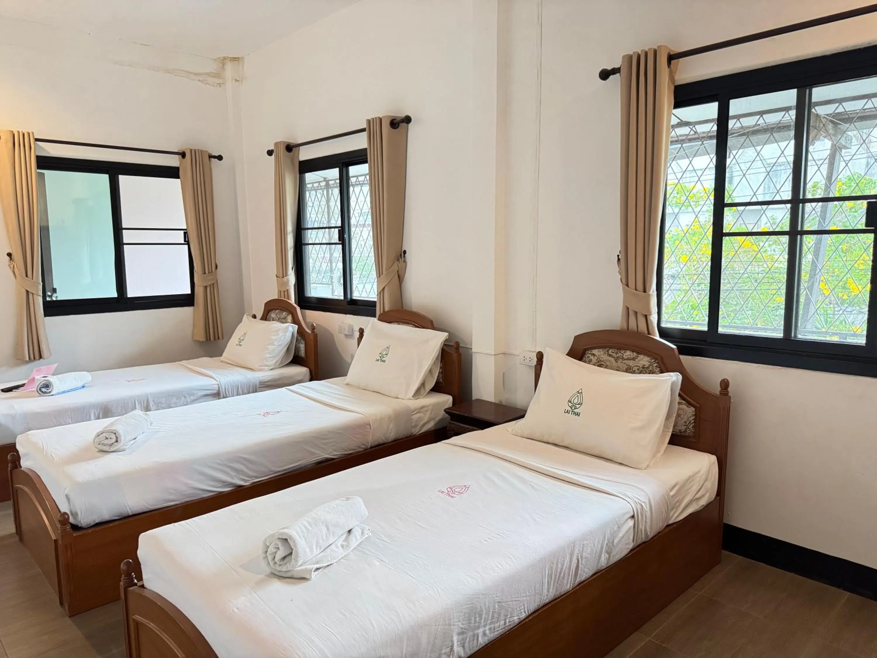 Bed in Lai Thai Guest House