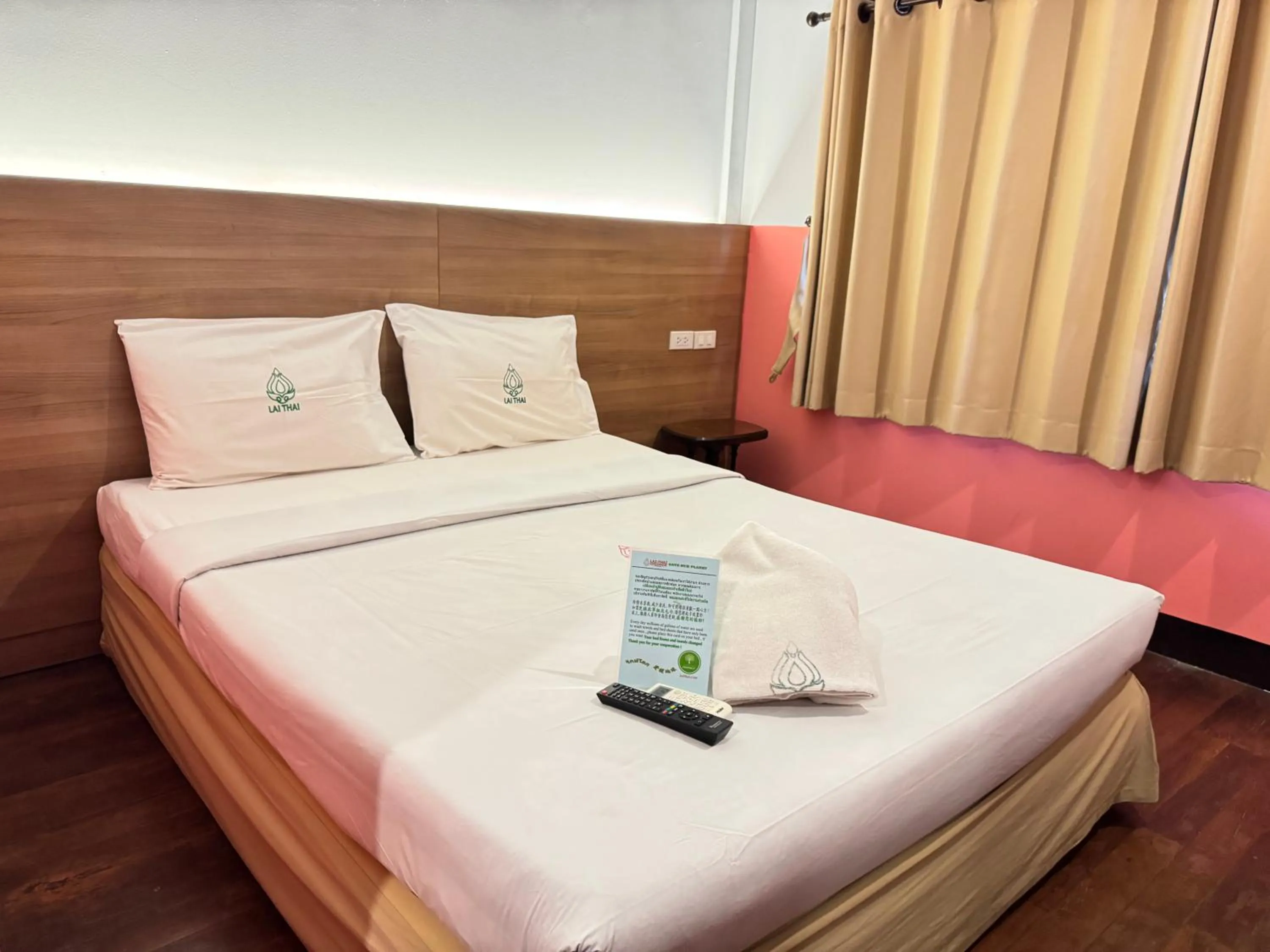 Bed in Lai Thai Guest House