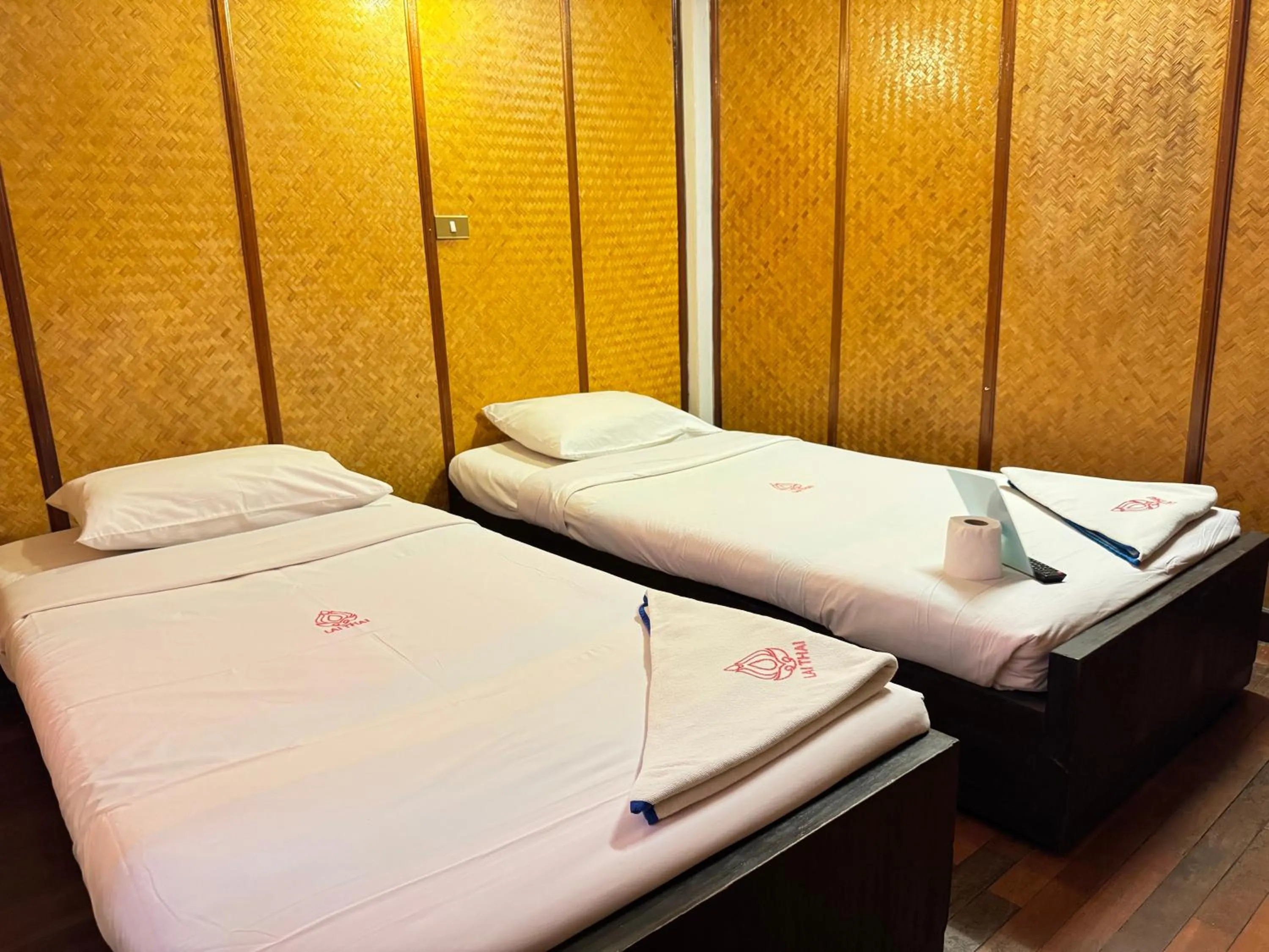 Bed in Lai Thai Guest House