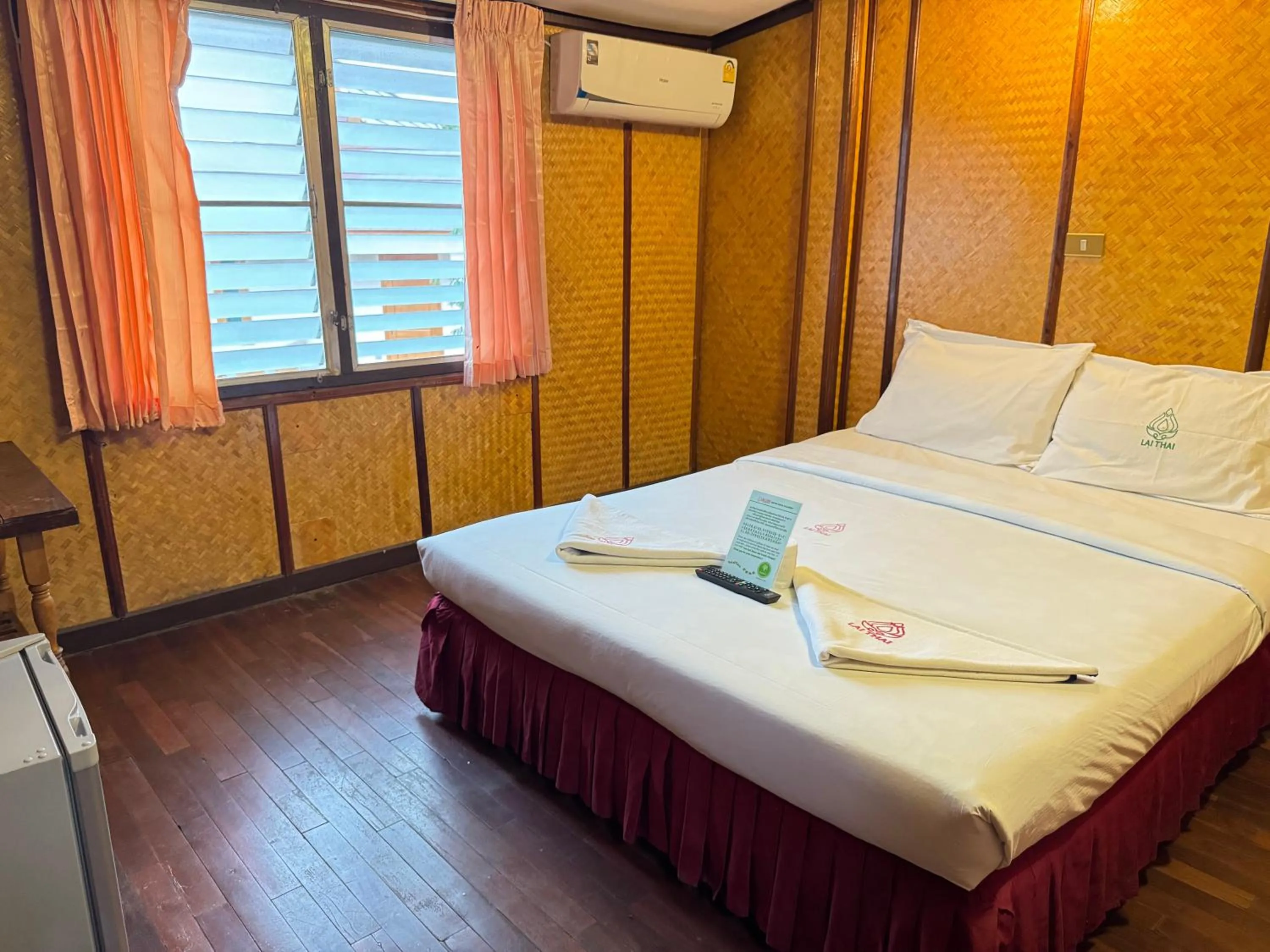 Bed in Lai Thai Guest House