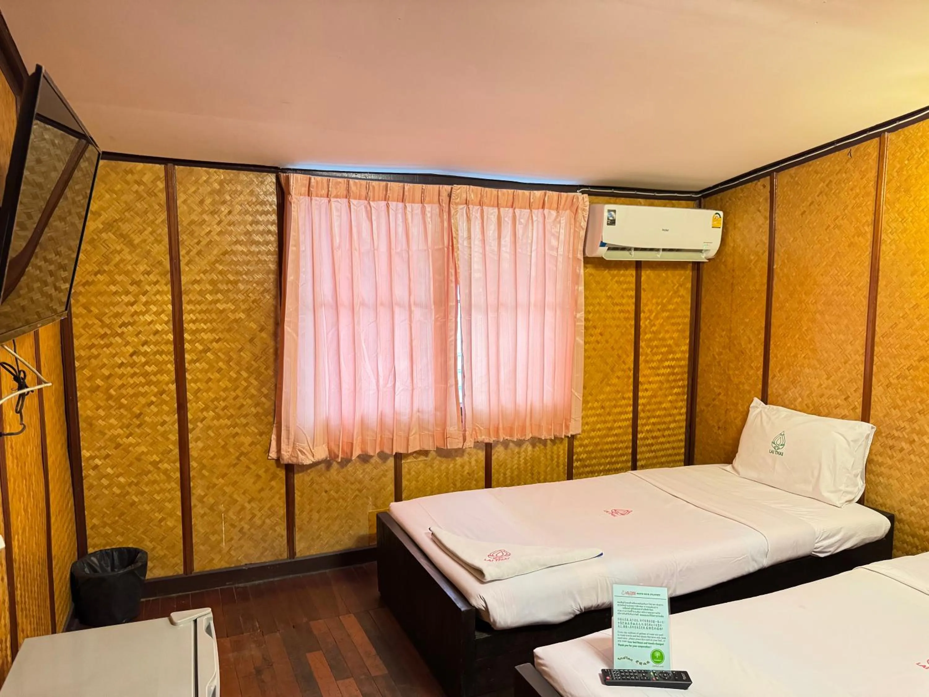 Bed in Lai Thai Guest House