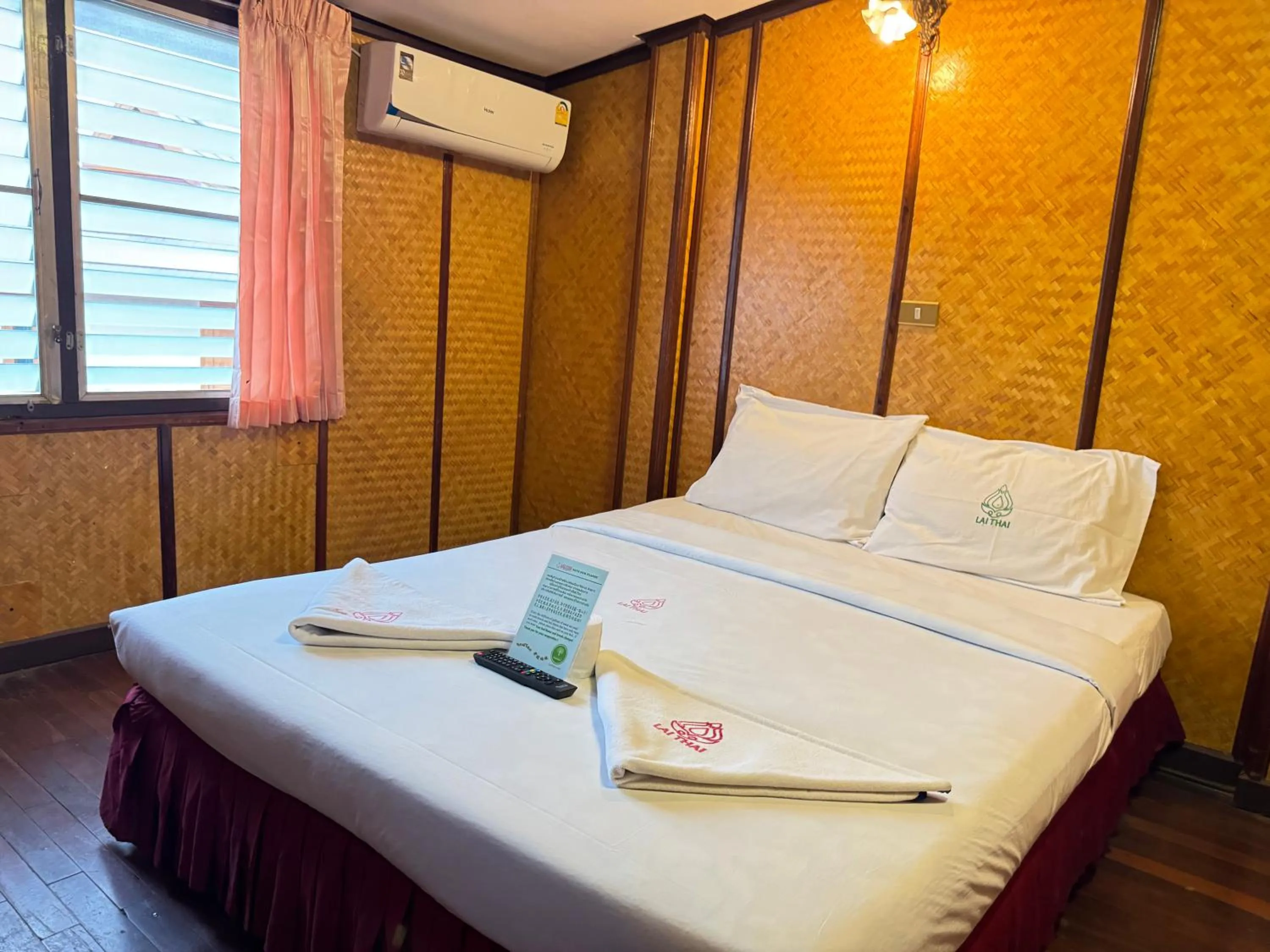 Bed in Lai Thai Guest House