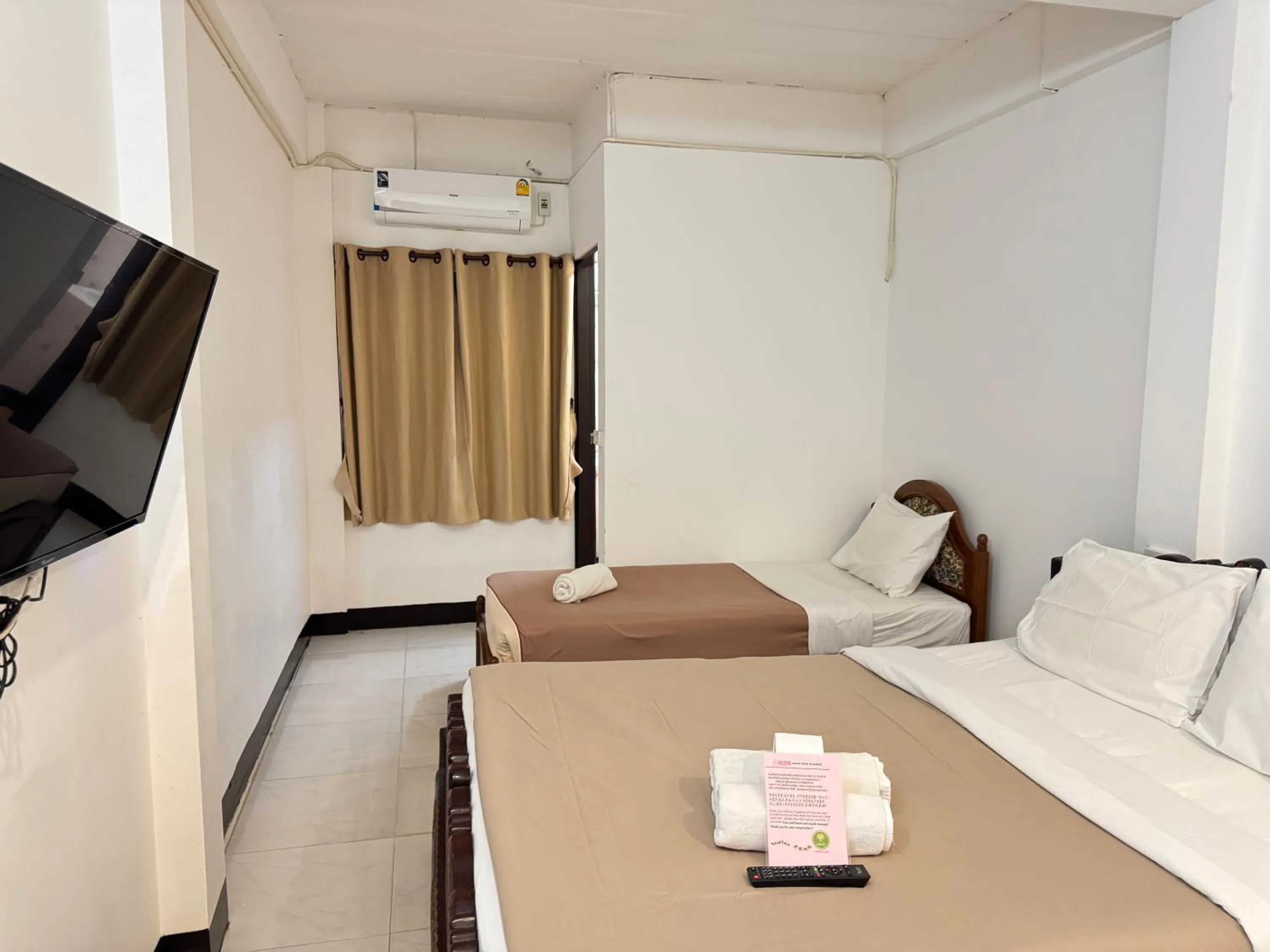 Bed in Lai Thai Guest House