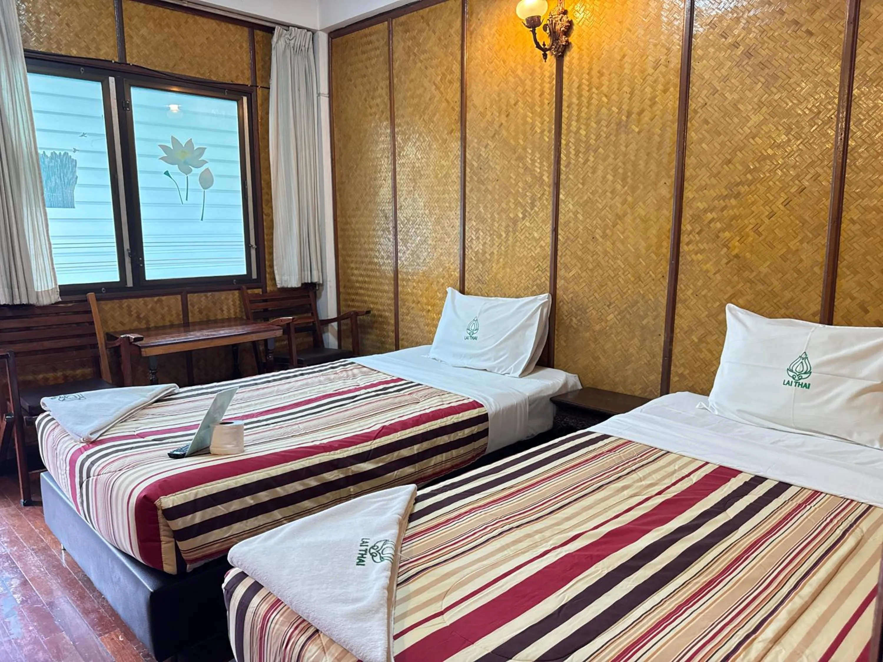 Bed in Lai Thai Guest House