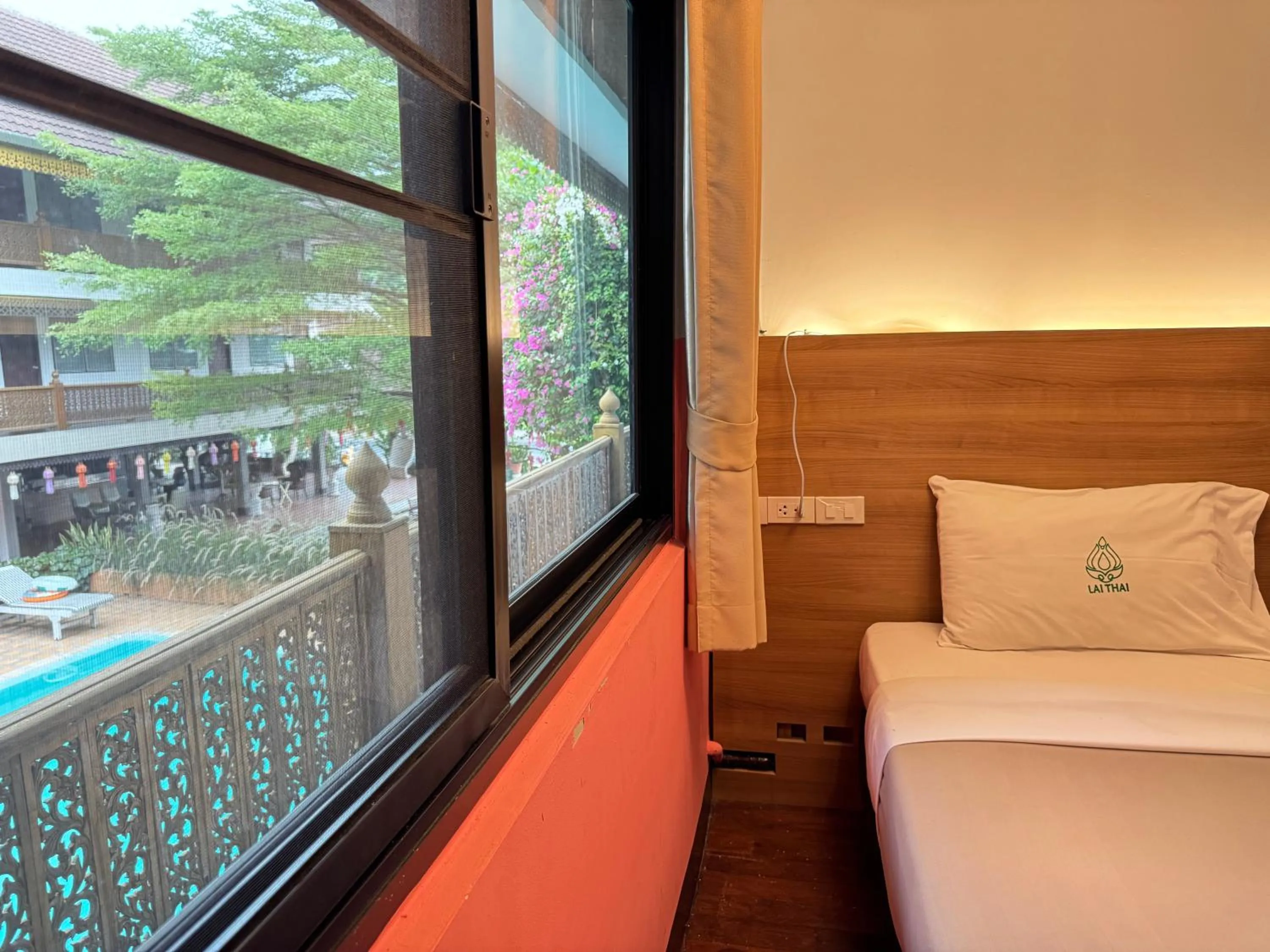 Bed in Lai Thai Guest House